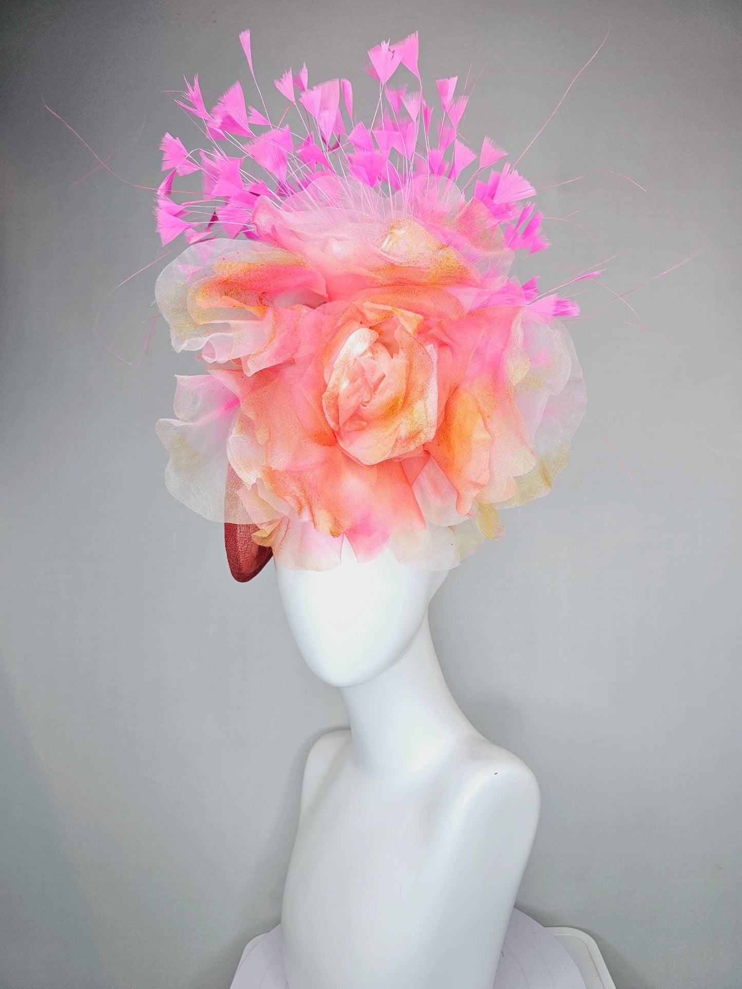 kentucky derby hat fascinator coral orange sinamay saucer with large apricot orange pink tie dye organza satin rose, pink branching feathers