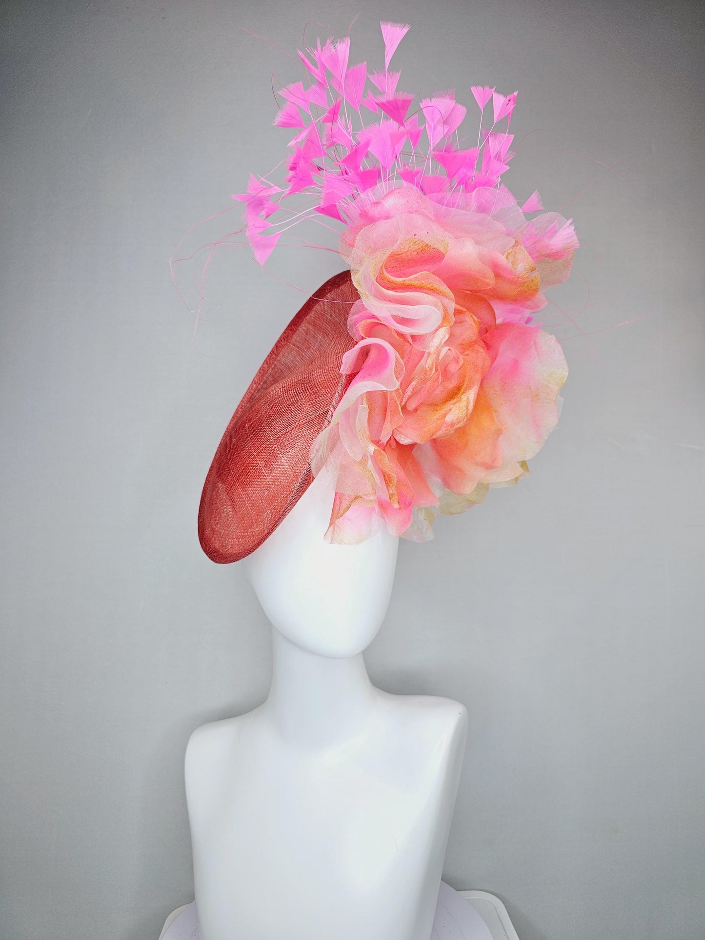 kentucky derby hat fascinator coral orange sinamay saucer with large apricot orange pink tie dye organza satin rose, pink branching feathers