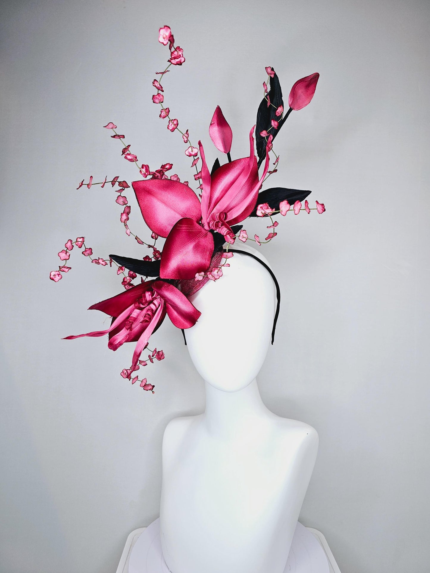 kentucky derby hat fascinator large ombre raspberry pink satin flowers with curls,black satin leaves,ombre pink flower stems on sinamay base