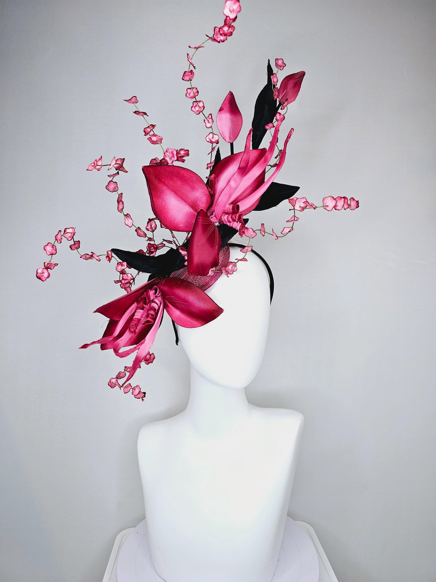 kentucky derby hat fascinator large ombre raspberry pink satin flowers with curls,black satin leaves,ombre pink flower stems on sinamay base