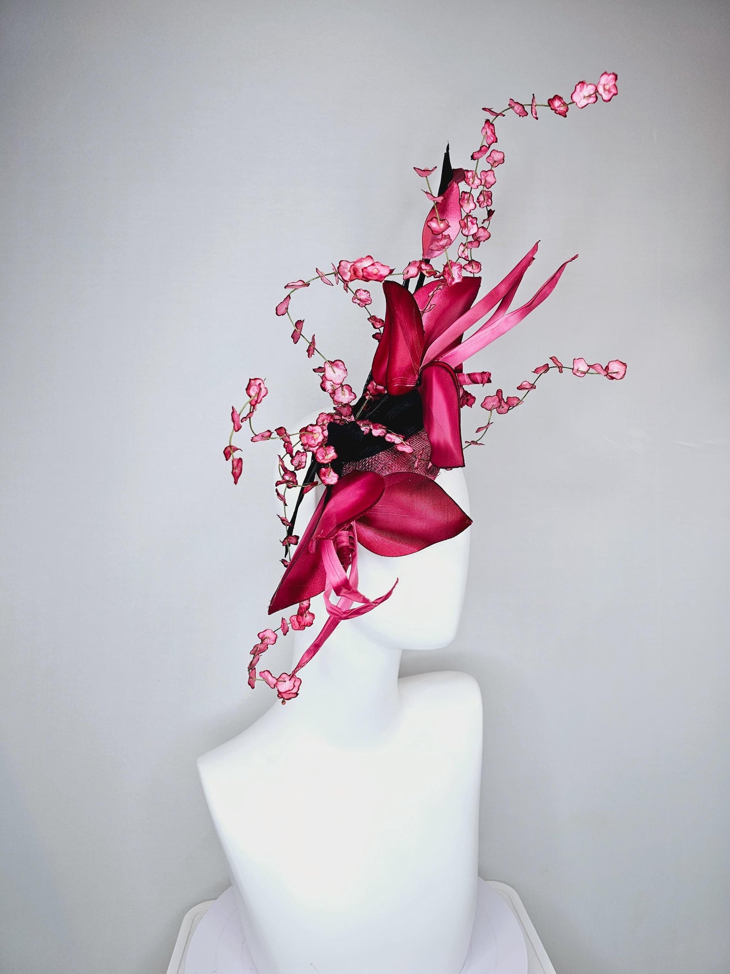 kentucky derby hat fascinator large ombre raspberry pink satin flowers with curls,black satin leaves,ombre pink flower stems on sinamay base