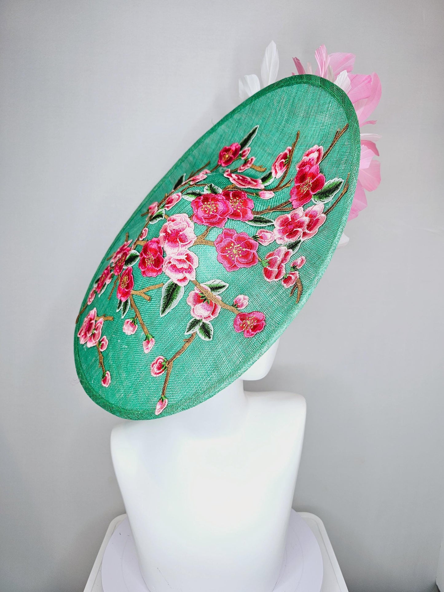 kentucky derby hat fascinator large mint green sinamay saucer with pink red green brown embroidered flowers, blush pink and white feathers