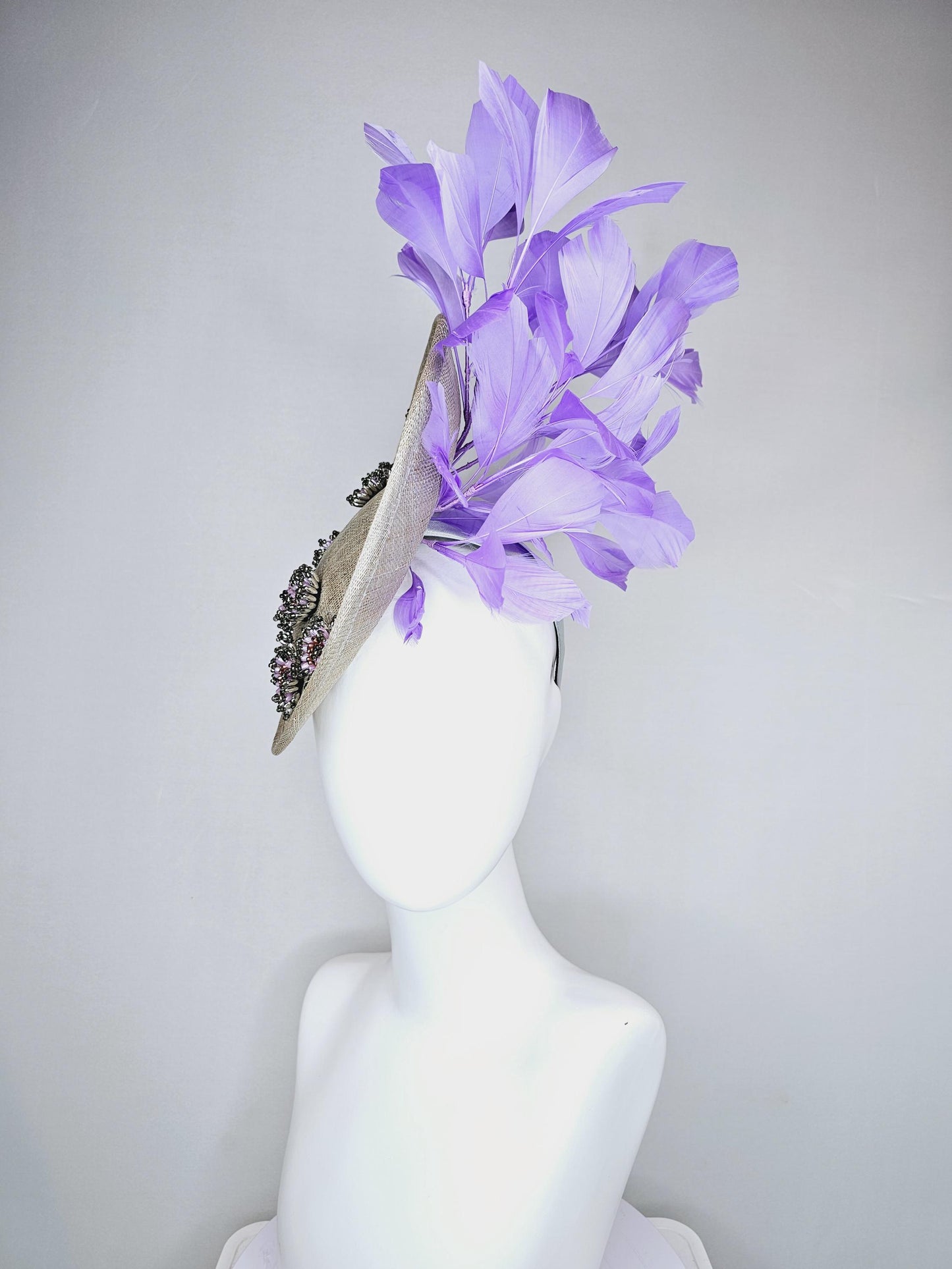 kentucky derby hat fascinator light gray sinamay saucer with silver lilac cooper crystal jewel beaded flowers and lavender purple feathers