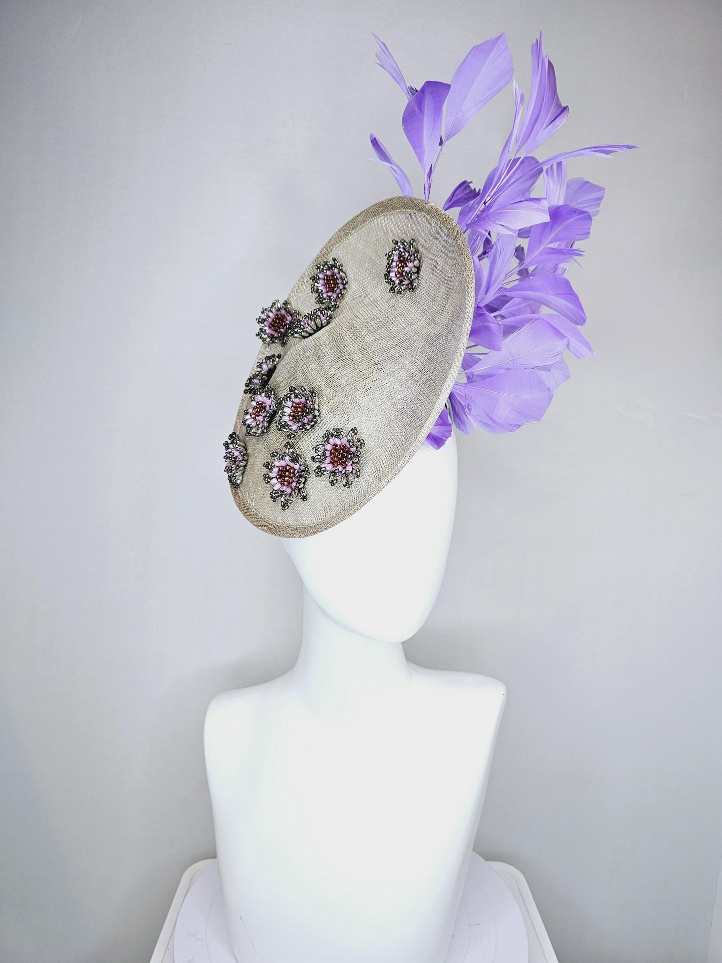 kentucky derby hat fascinator light gray sinamay saucer with silver lilac cooper crystal jewel beaded flowers and lavender purple feathers