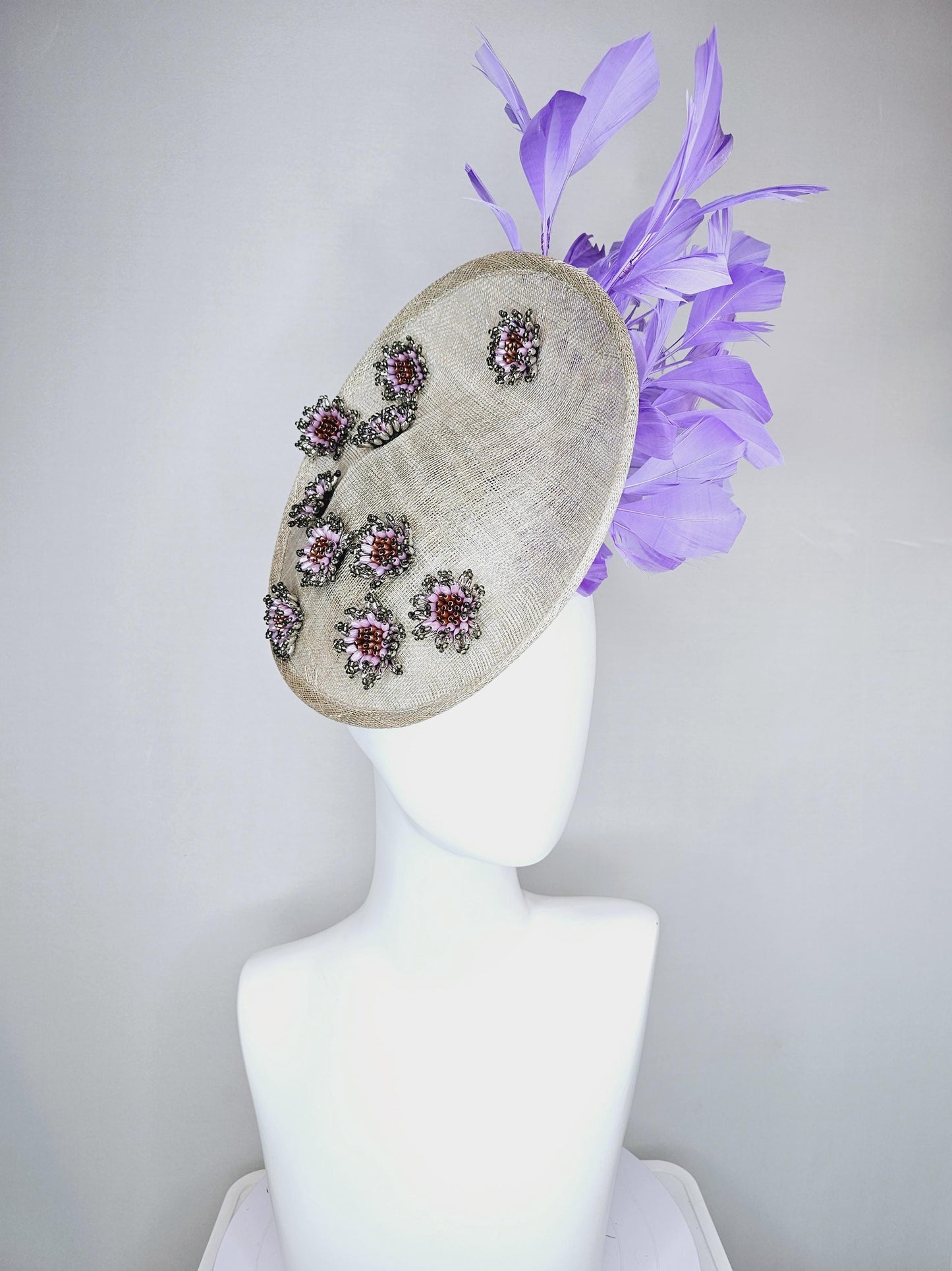 kentucky derby hat fascinator light gray sinamay saucer with silver lilac cooper crystal jewel beaded flowers and lavender purple feathers