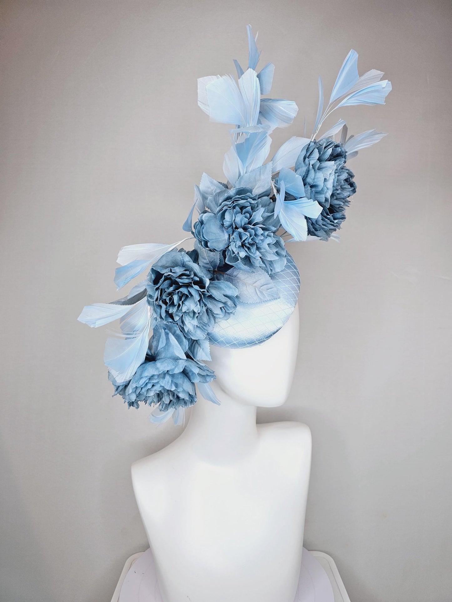 kentucky derby hat fascinator light blue satin with netting,satin silk large cerulean blue flowers,blue leaves and light baby blue feathers