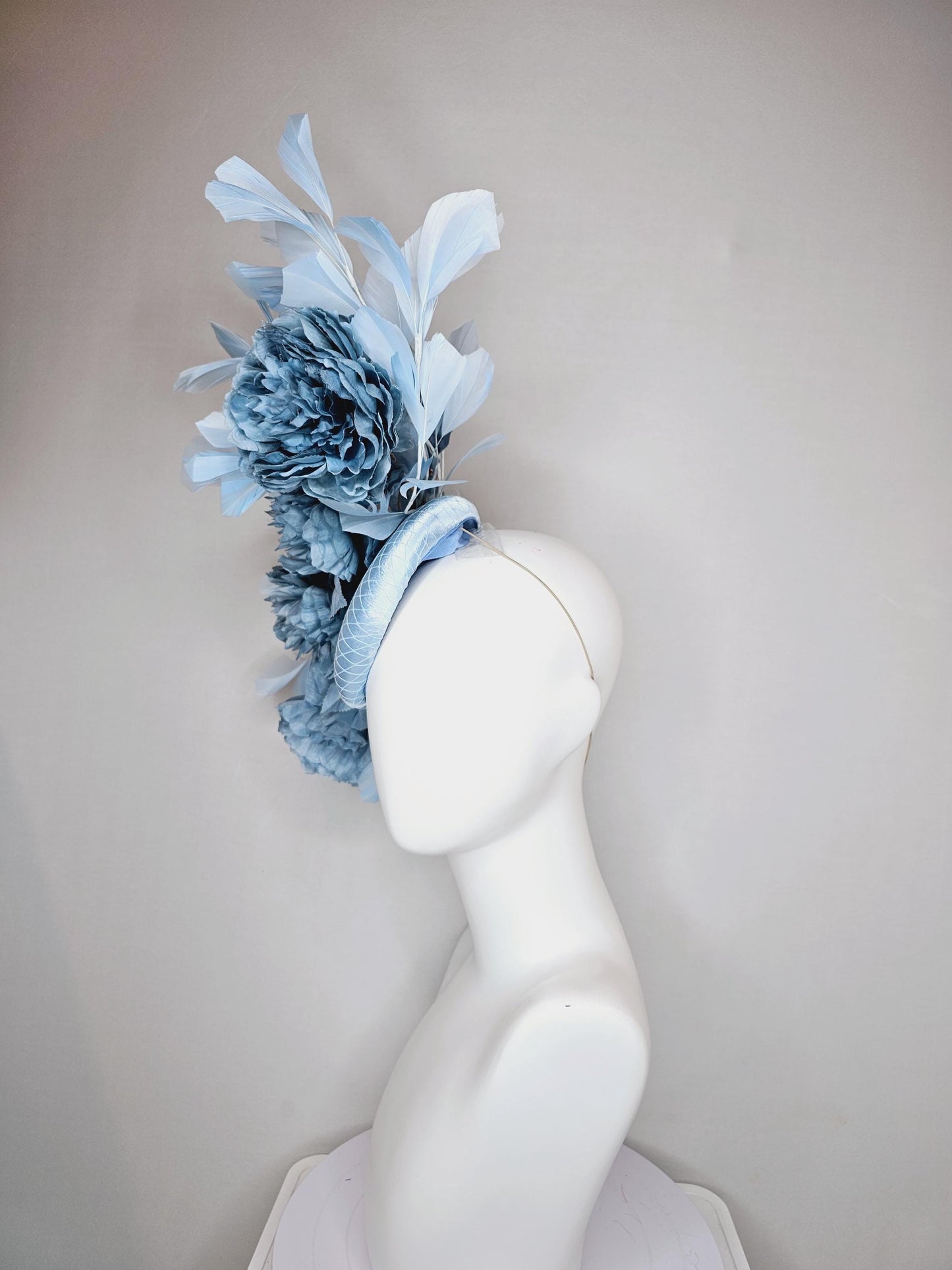 kentucky derby hat fascinator light blue satin with netting,satin silk large cerulean blue flowers,blue leaves and light baby blue feathers