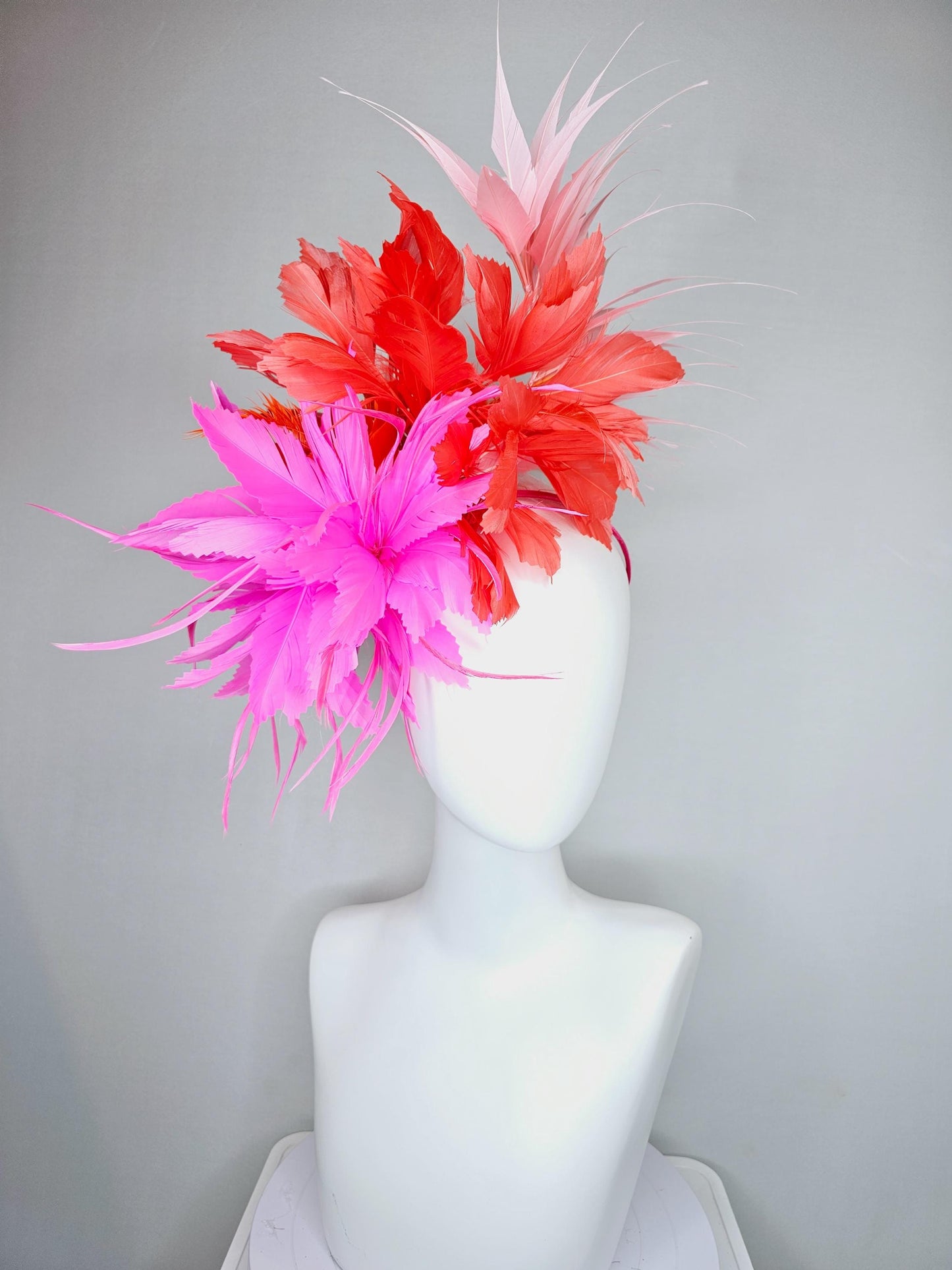 kentucky derby hat fascinator bright hot pink fluffy feather flower with coral orange branching feathers and light pink pointy feathers