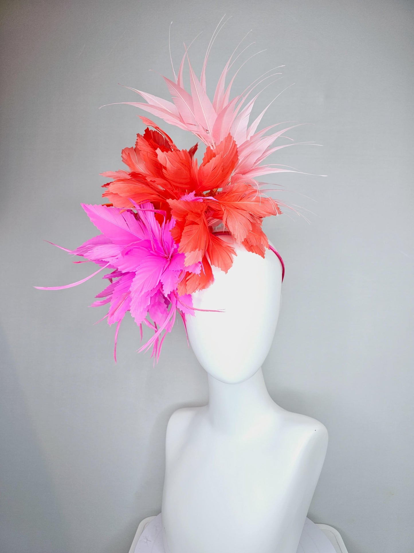 kentucky derby hat fascinator bright hot pink fluffy feather flower with coral orange branching feathers and light pink pointy feathers