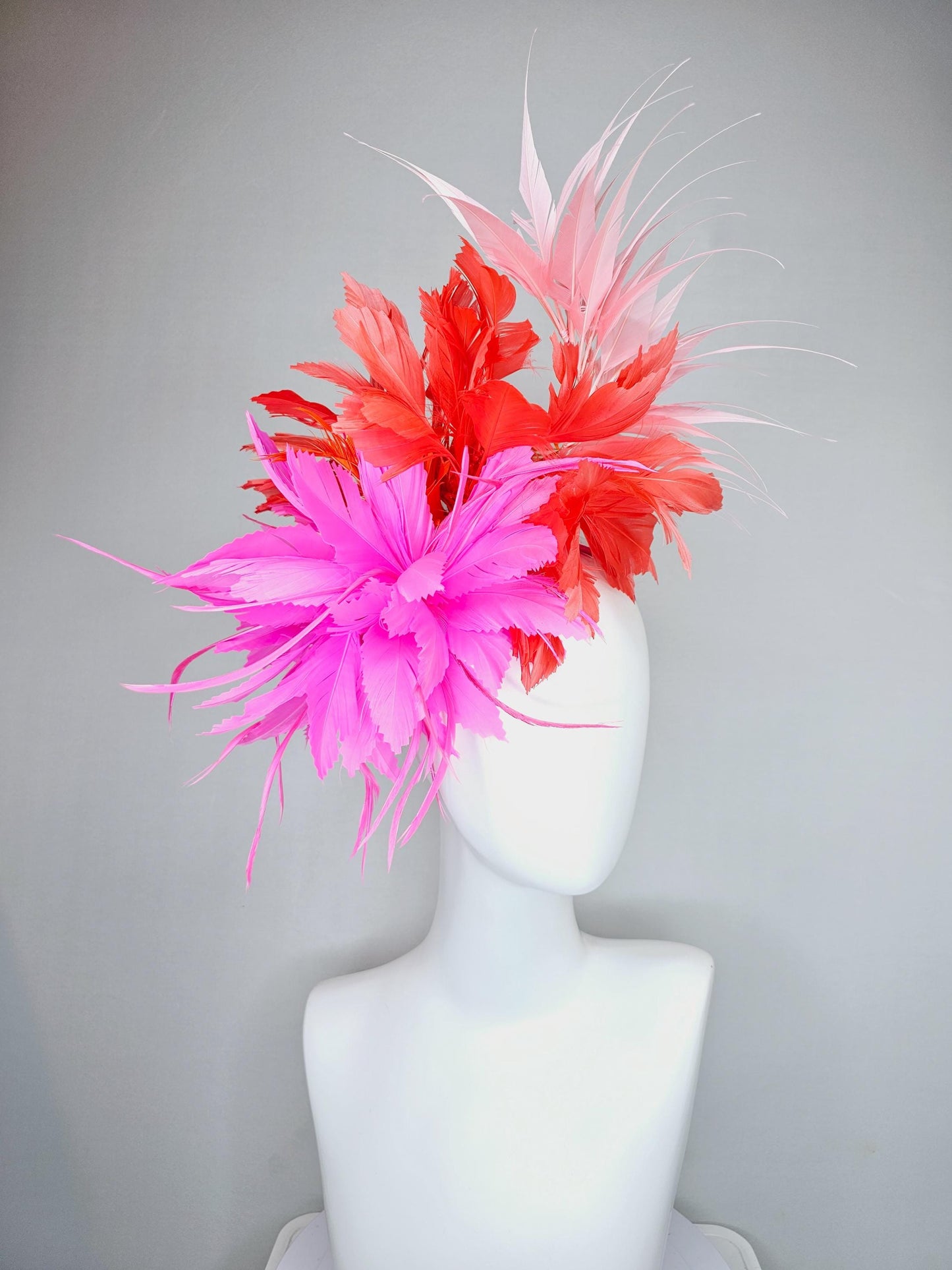 kentucky derby hat fascinator bright hot pink fluffy feather flower with coral orange branching feathers and light pink pointy feathers