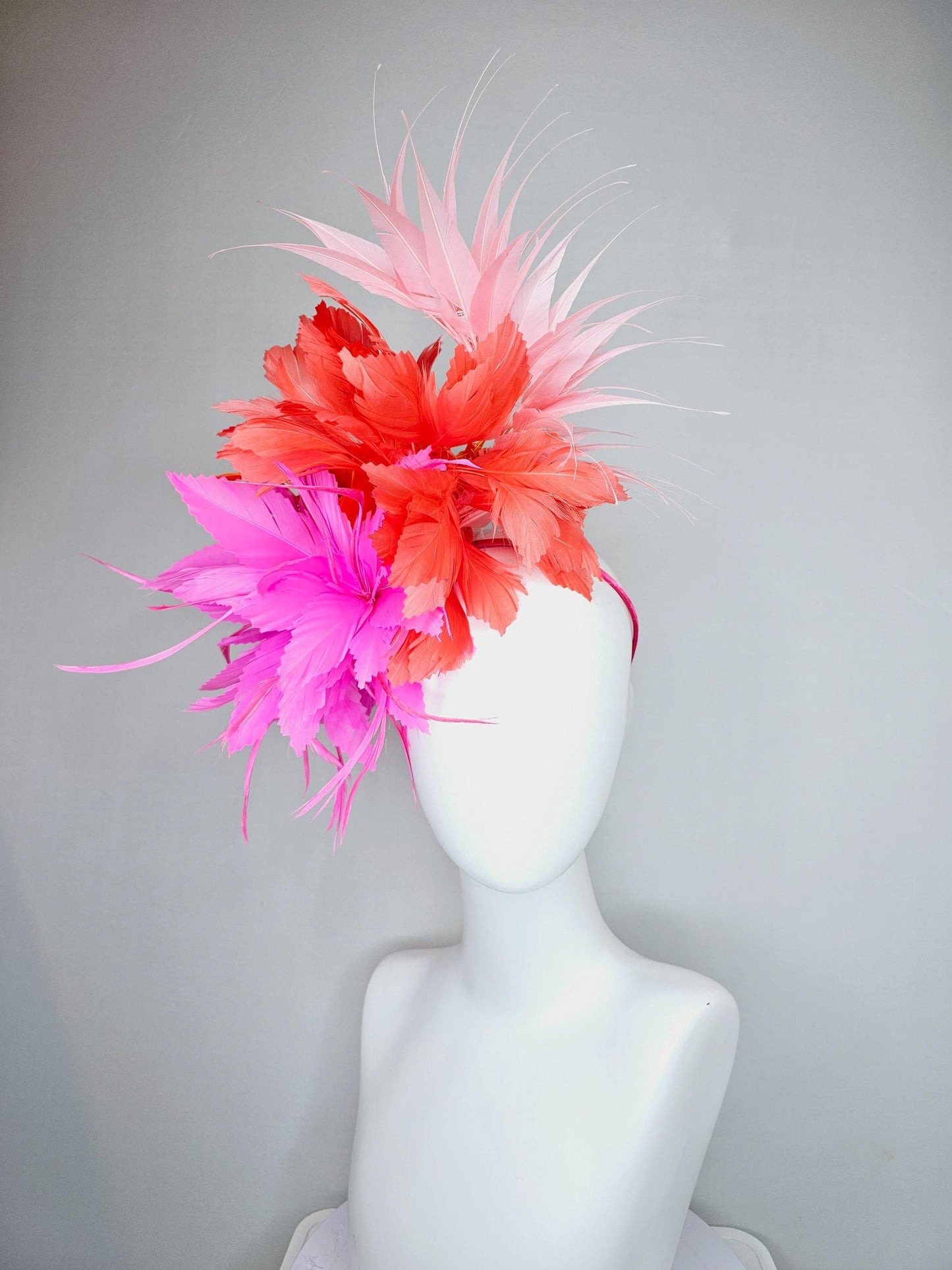 kentucky derby hat fascinator bright hot pink fluffy feather flower with coral orange branching feathers and light pink pointy feathers