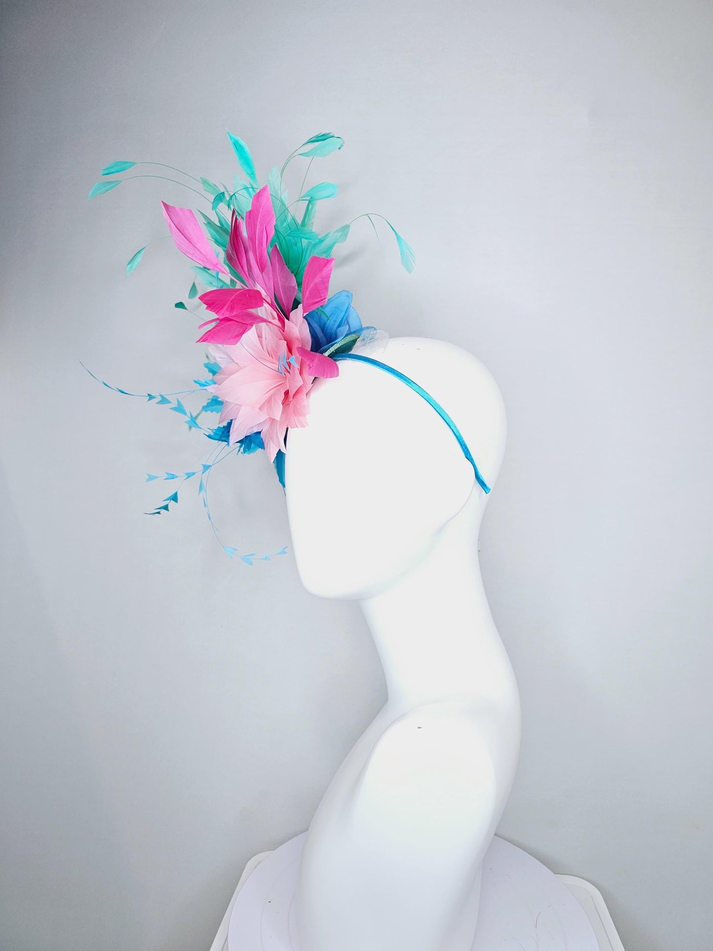 kentucky derby hat fascinator zigzag sky blue and light pink feather flowers with hot pink and turquoise green blue branching feathers