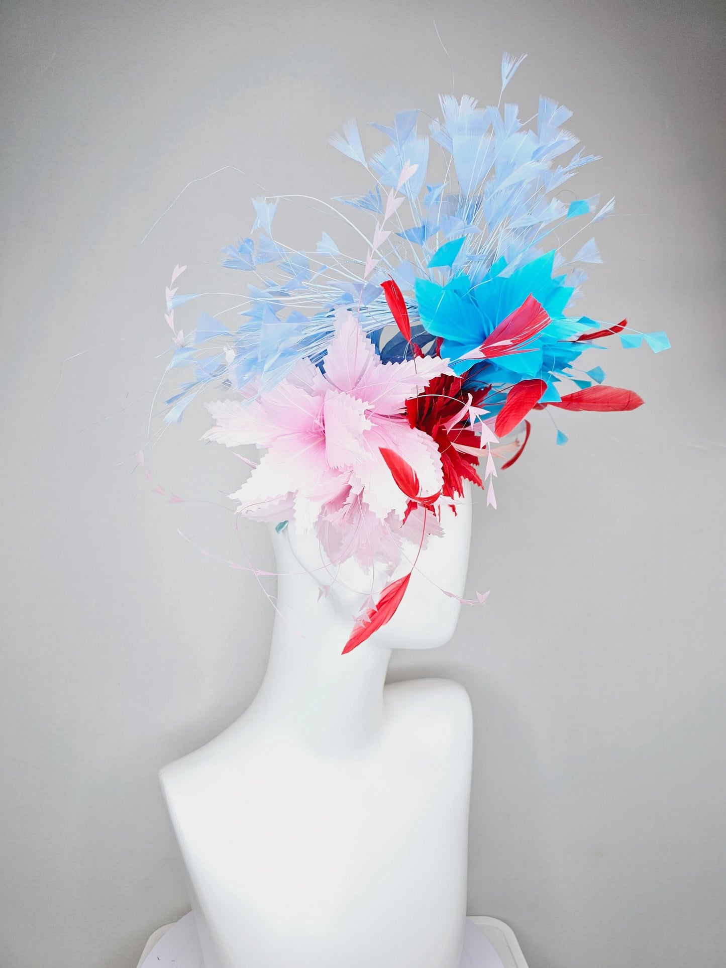 kentucky derby hat fascinator light pink and cherry red zigzag feather flowers with bright sky blue and light blue branching feathers