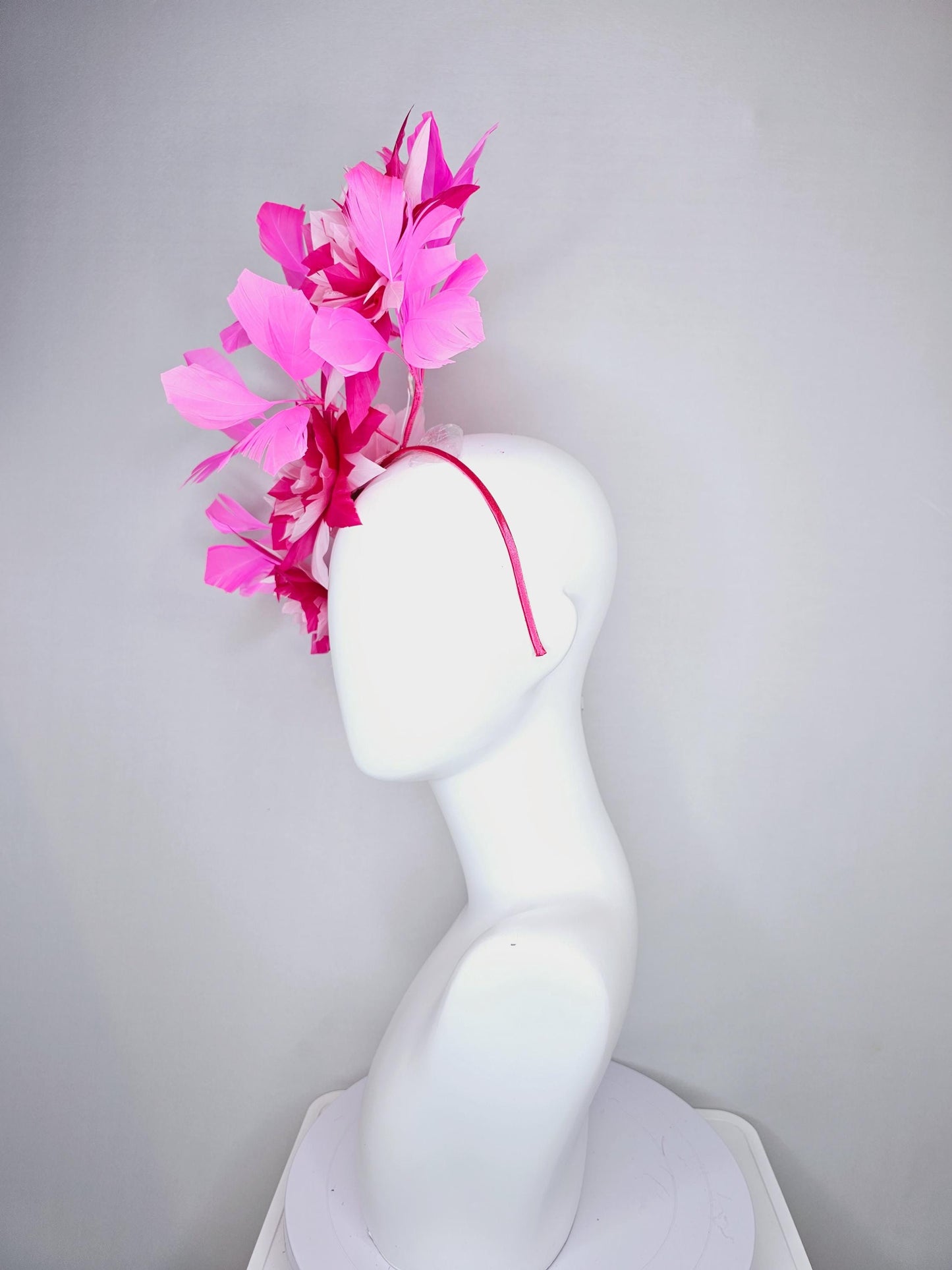 kentucky derby hat fascinator with large light baby pink raspberry hot pink feather flowers and blush pink branching feathers