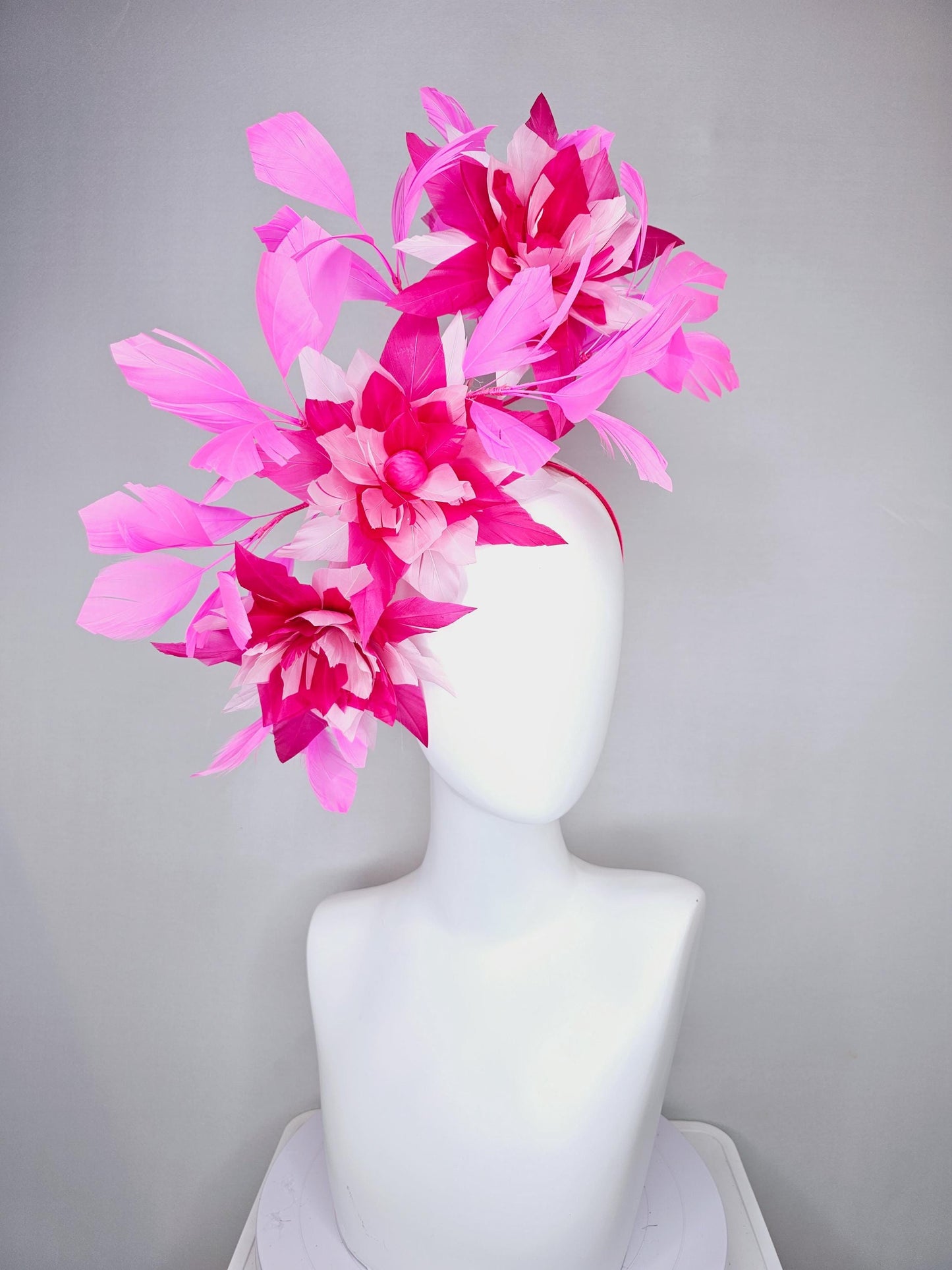 kentucky derby hat fascinator with large light baby pink raspberry hot pink feather flowers and blush pink branching feathers