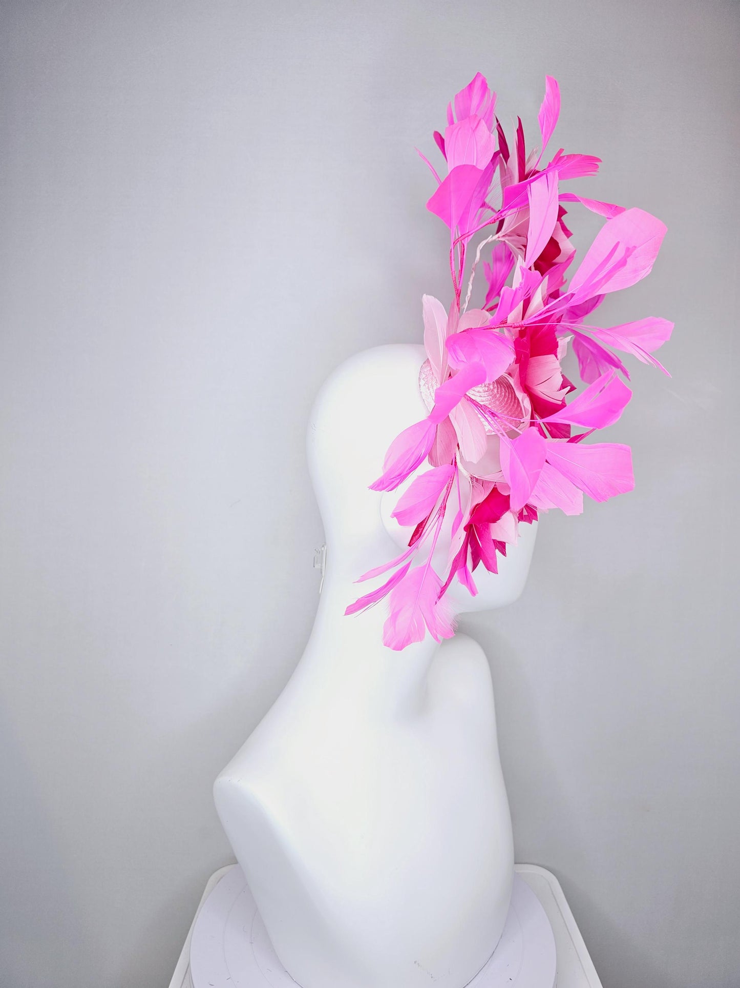 kentucky derby hat fascinator with large light baby pink raspberry hot pink feather flowers and blush pink branching feathers