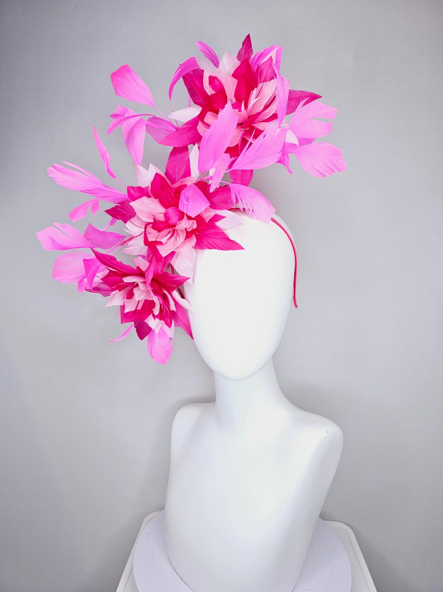 kentucky derby hat fascinator with large light baby pink raspberry hot pink feather flowers and blush pink branching feathers