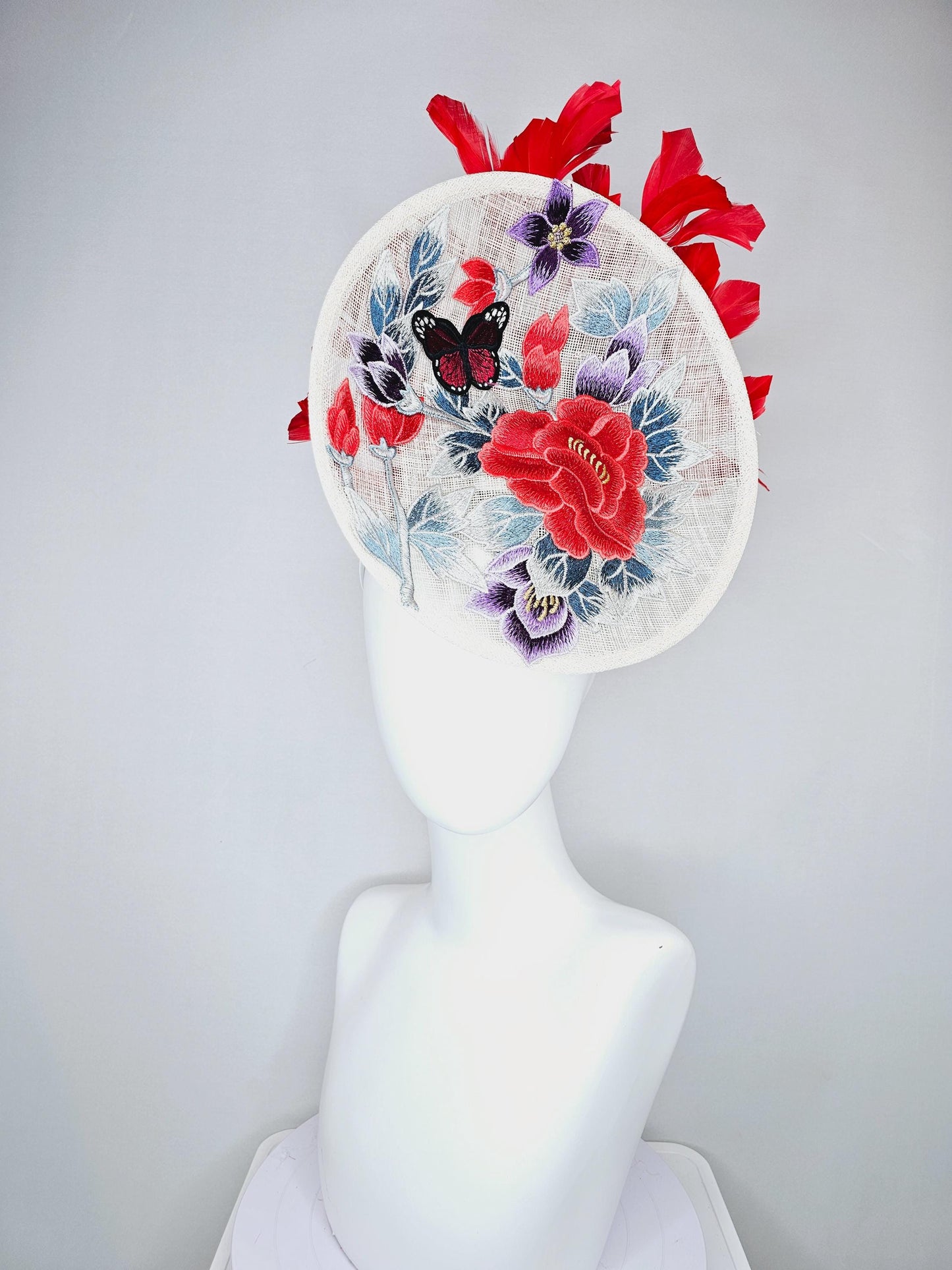 kentucky derby hat fascinator white sinamay saucer with red blue purple black embroidered flowers butterfly, scarlet red branching feathers