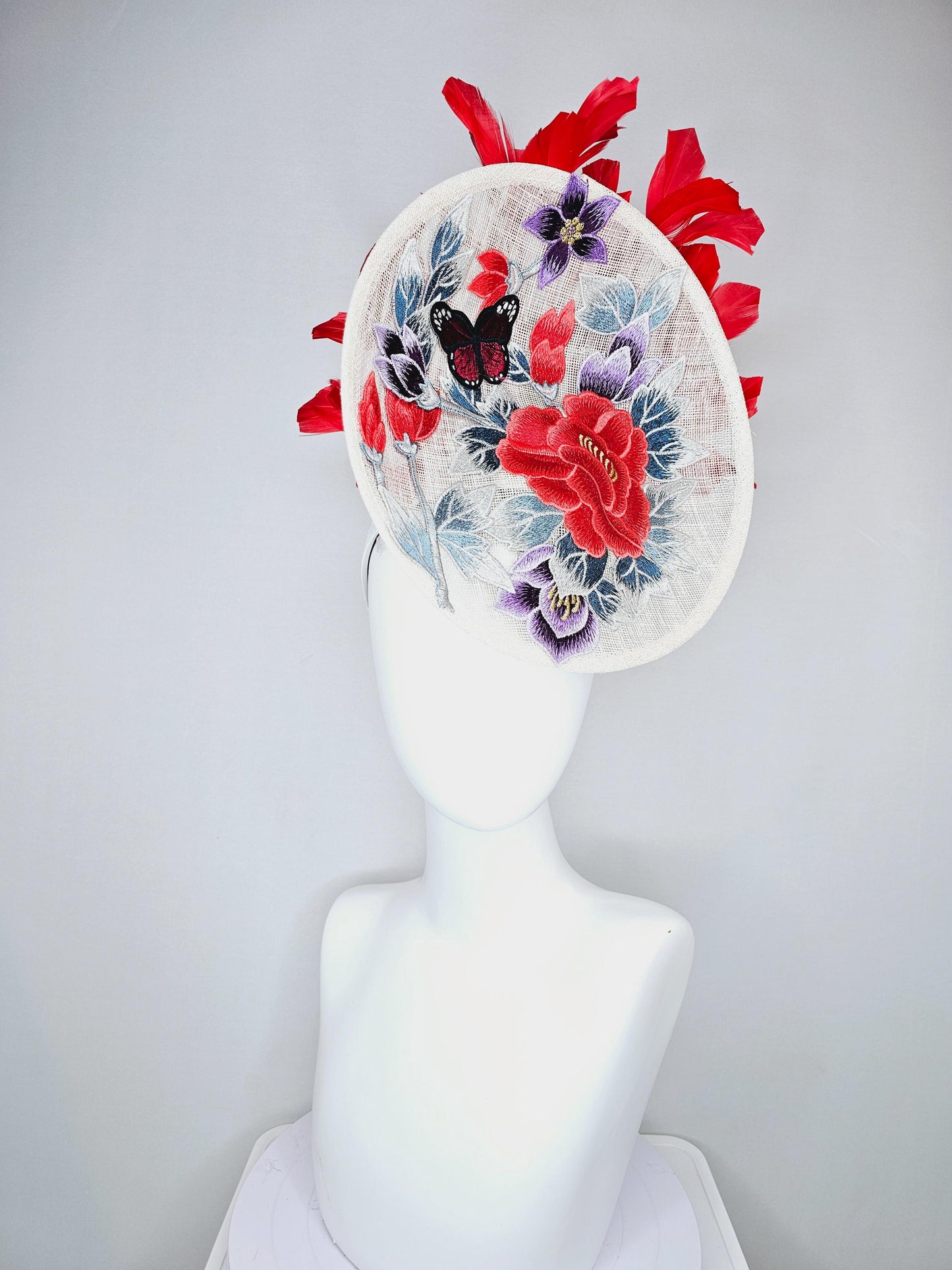 kentucky derby hat fascinator white sinamay saucer with red blue purple black embroidered flowers butterfly, scarlet red branching feathers