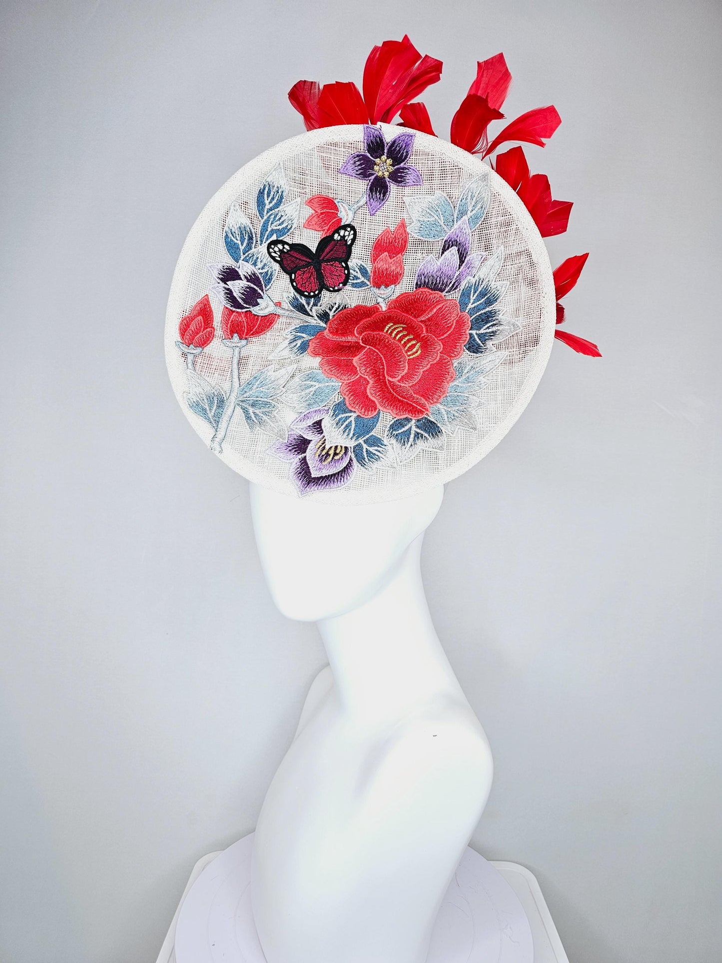 kentucky derby hat fascinator white sinamay saucer with red blue purple black embroidered flowers butterfly, scarlet red branching feathers