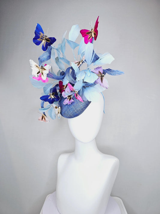 kentucky derby hat fascinator blue sinamay with curls,light blue branching feathers and colorful pink,purple,white,dark blue butterflies