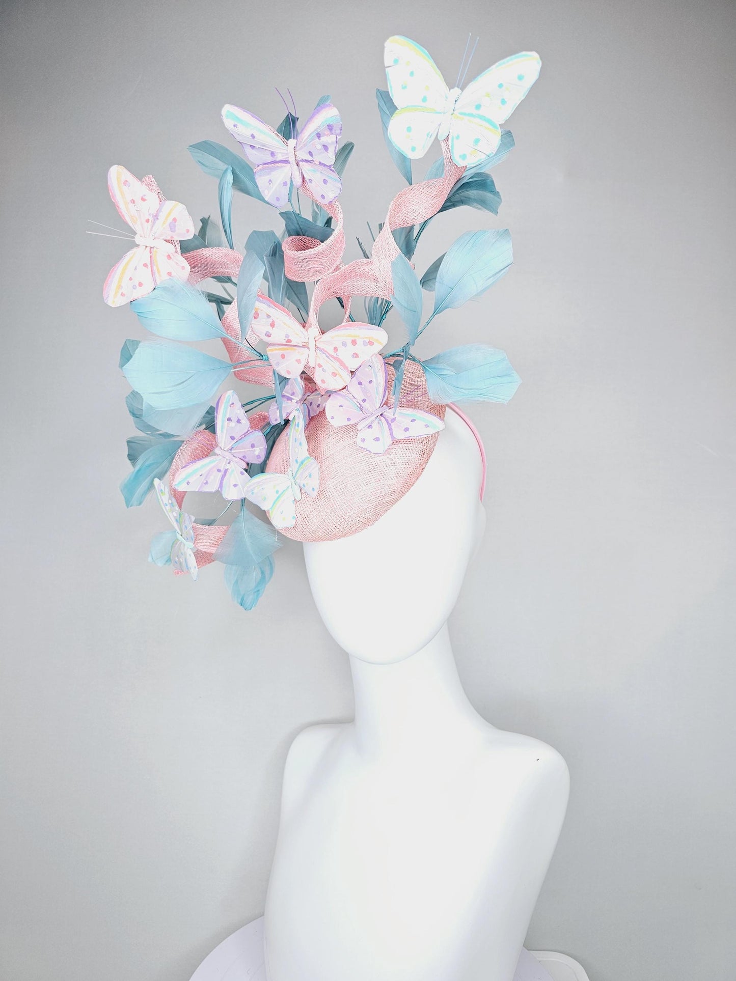 kentucky derby hat fascinator light baby pink sinamay with curls,light blue branching feathers,ivory,pink,purple,yellow,blue butterflies