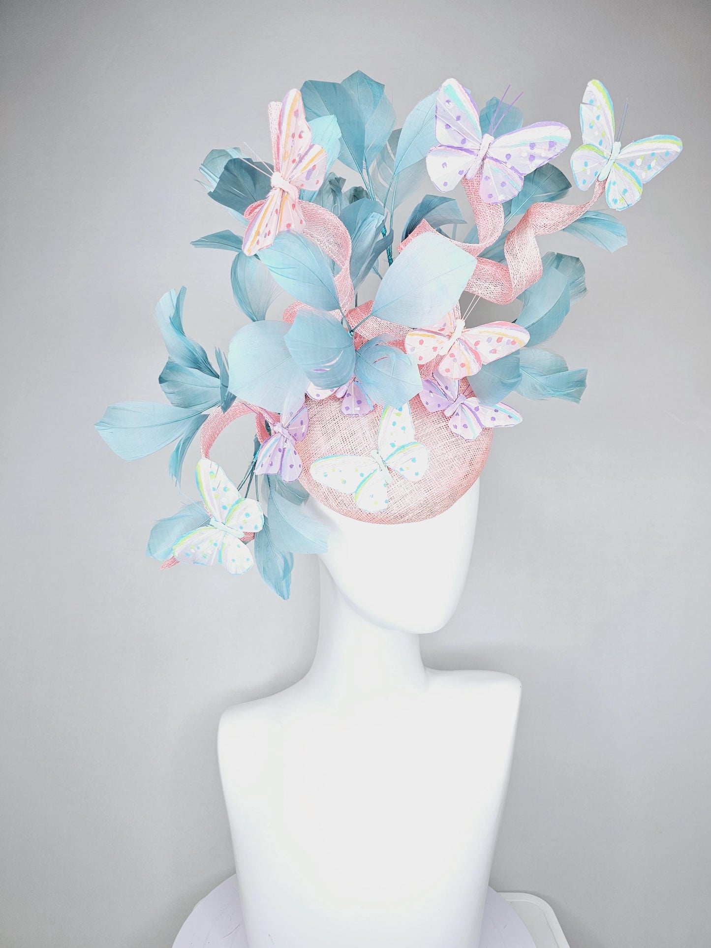 kentucky derby hat fascinator light baby pink sinamay with curls,light blue branching feathers,ivory,pink,purple,yellow,blue butterflies