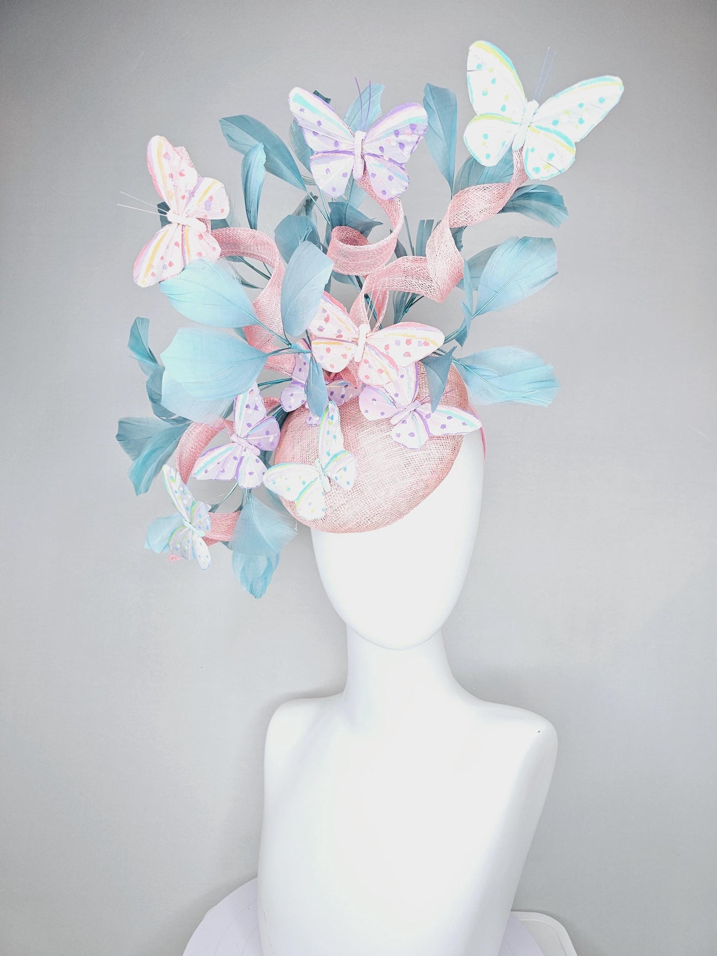 kentucky derby hat fascinator light baby pink sinamay with curls,light blue branching feathers,ivory,pink,purple,yellow,blue butterflies