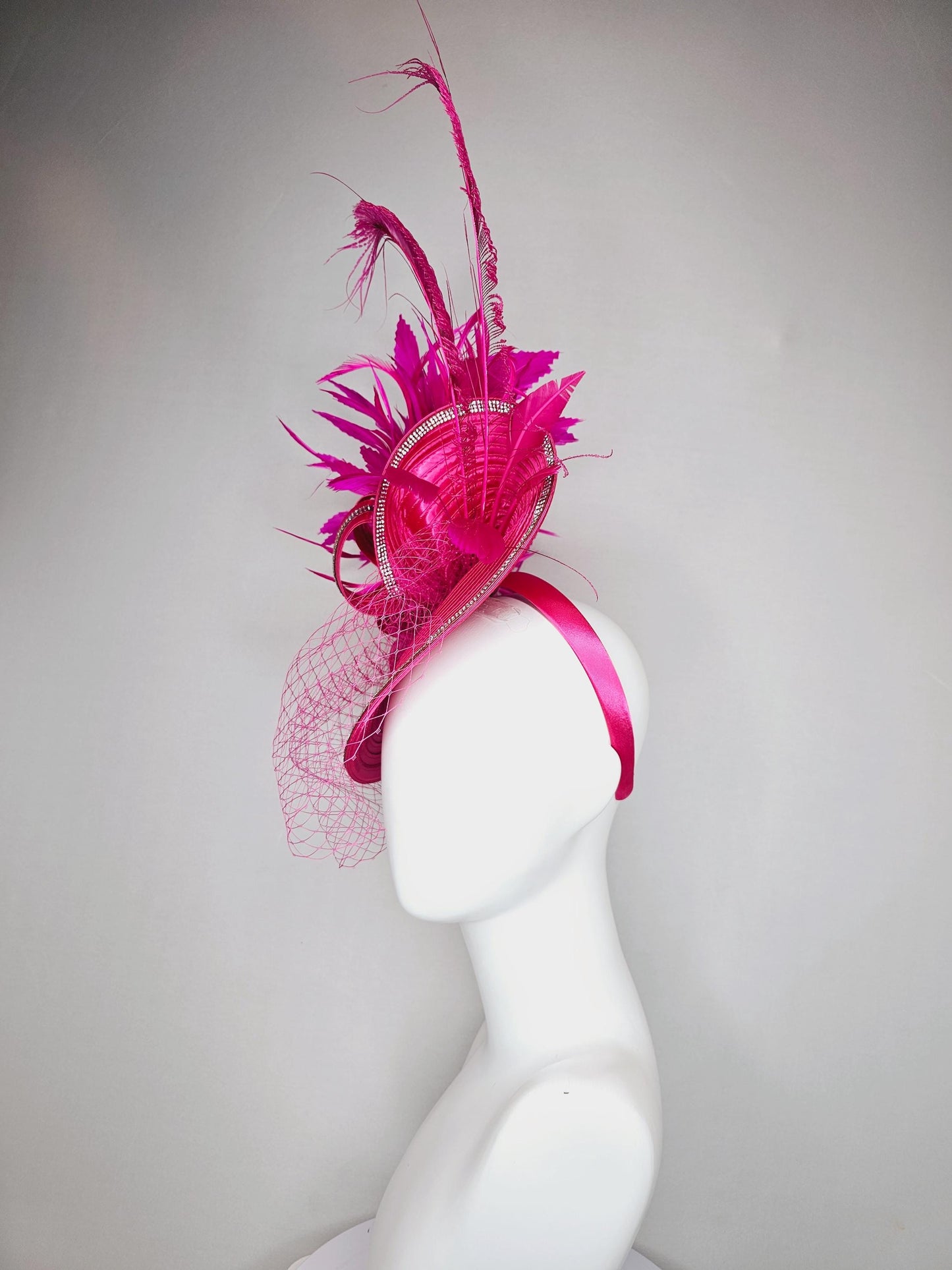 kentucky derby hat fascinator hot pink satin saucer with crystal rhinestone beading and satin beaded bow,and fuchsia pink branching feathers