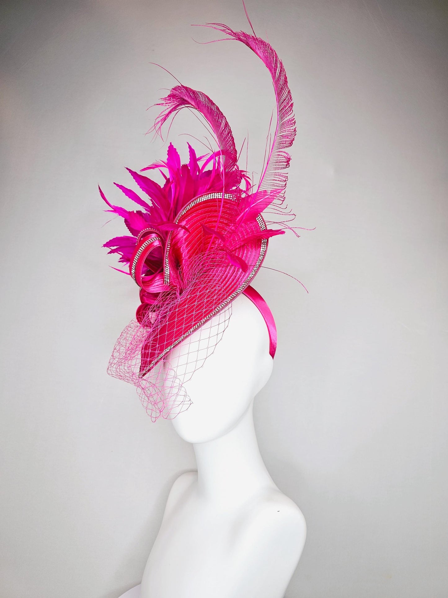 kentucky derby hat fascinator hot pink satin saucer with crystal rhinestone beading and satin beaded bow,and fuchsia pink branching feathers