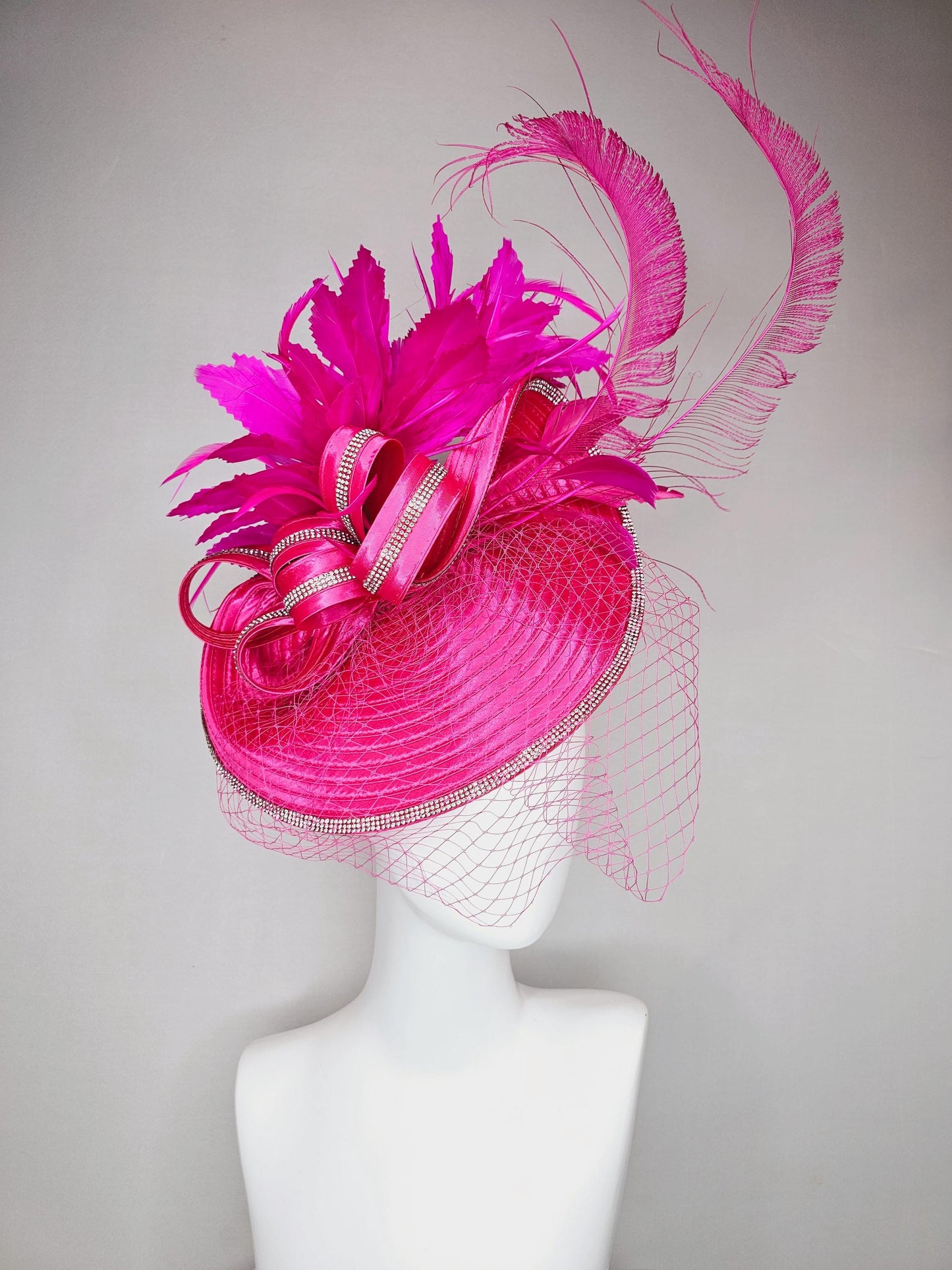 kentucky derby hat fascinator hot pink satin saucer with crystal rhinestone beading and satin beaded bow,and fuchsia pink branching feathers