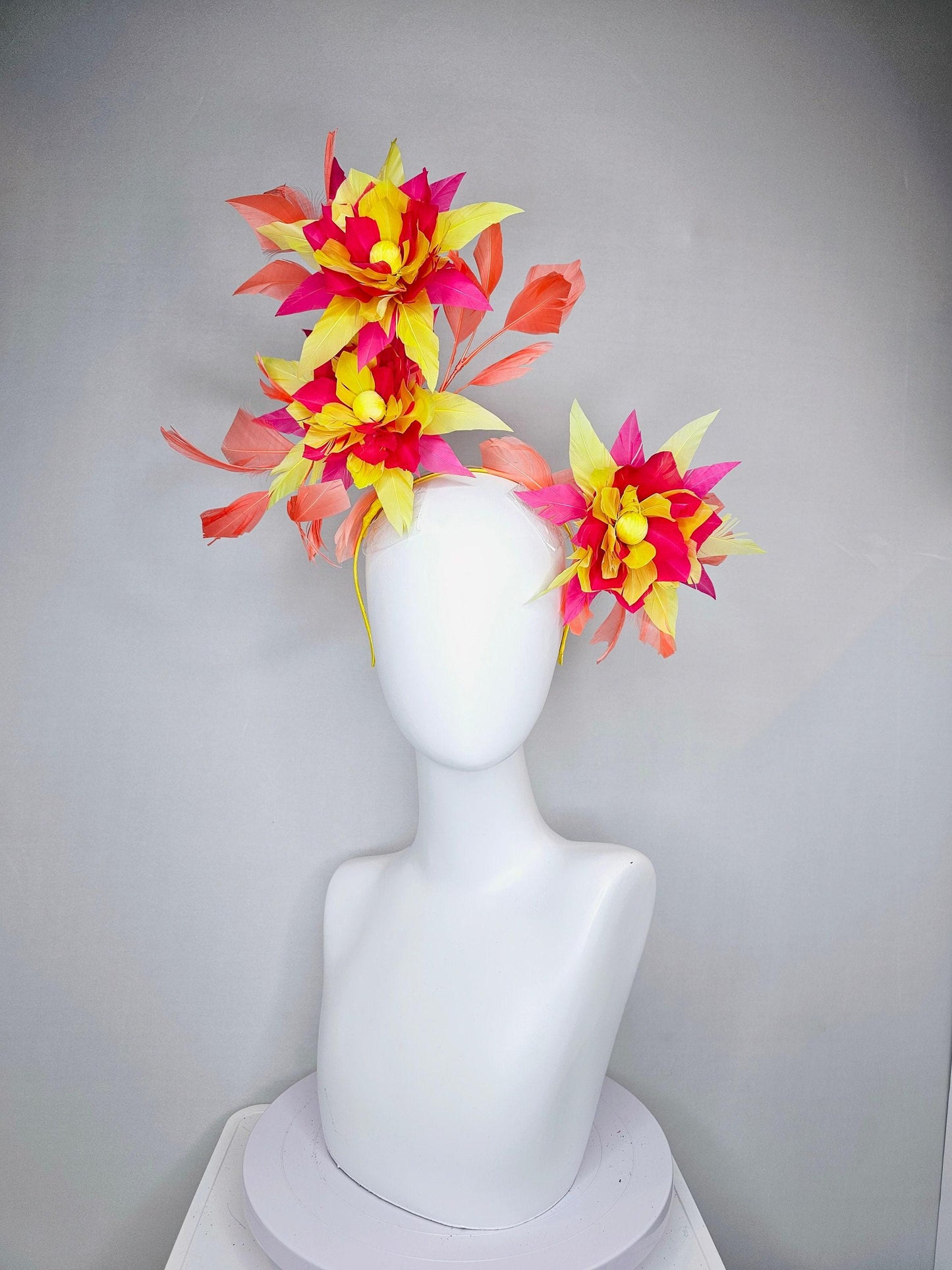 kentucky derby hat fascinator pink and yellow feather flowers with coral feathers on thin headband