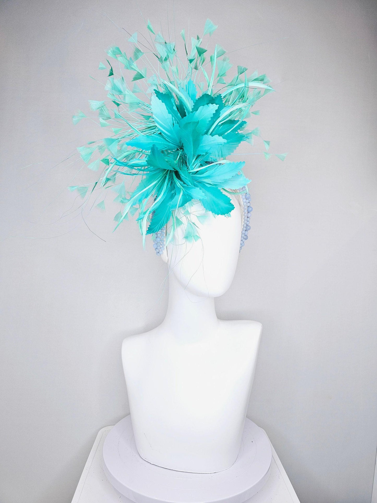 kentucky derby hat fascinator green feather flower and feathers with light blue pearl beaded headband