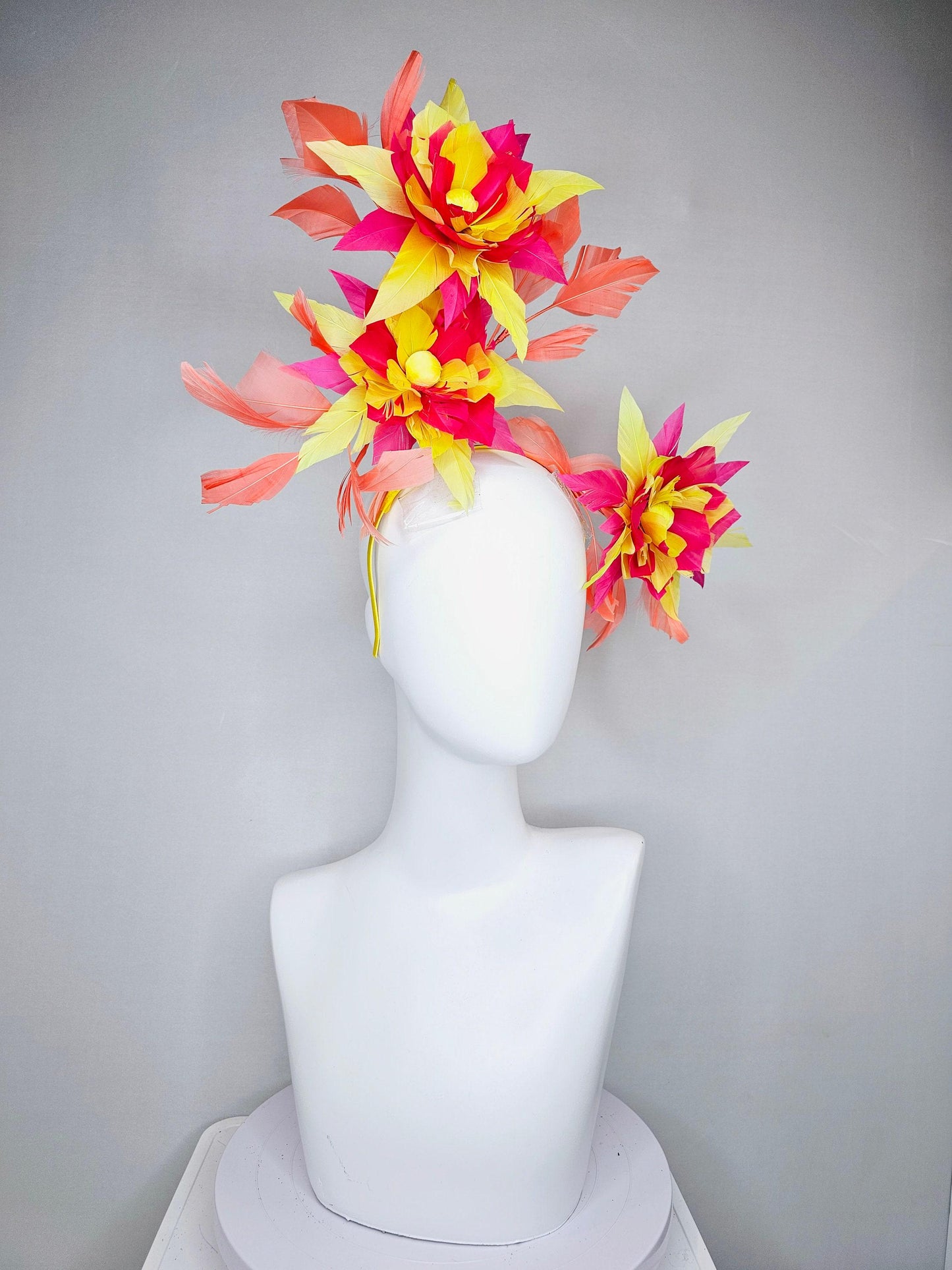 kentucky derby hat fascinator pink and yellow feather flowers with coral feathers on thin headband