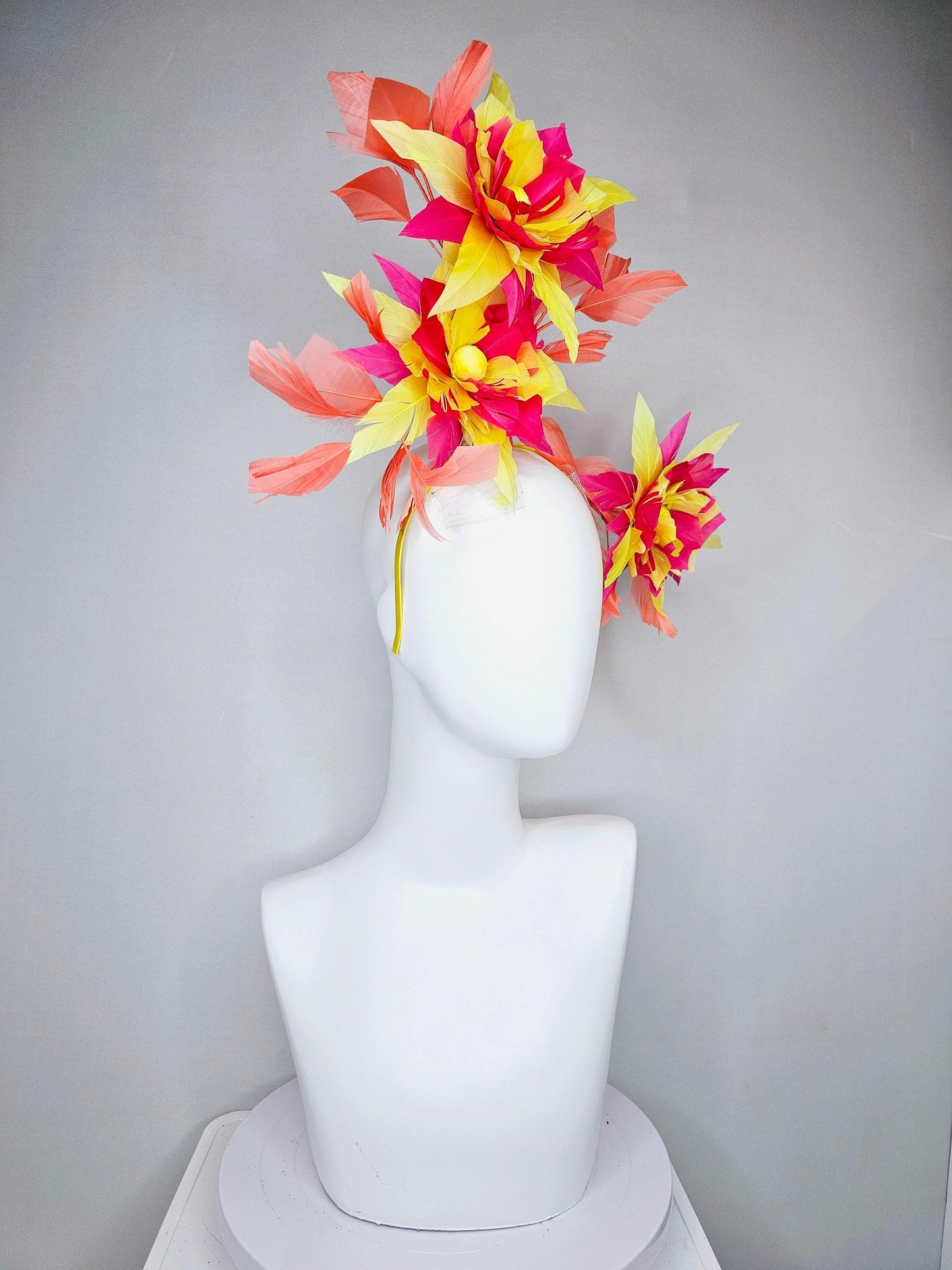 kentucky derby hat fascinator pink and yellow feather flowers with coral feathers on thin headband