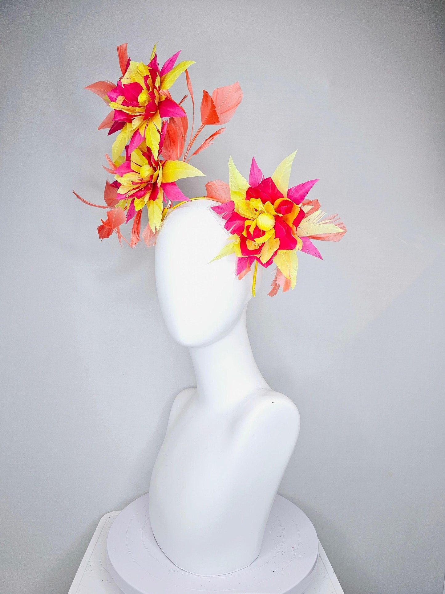 kentucky derby hat fascinator pink and yellow feather flowers with coral feathers on thin headband