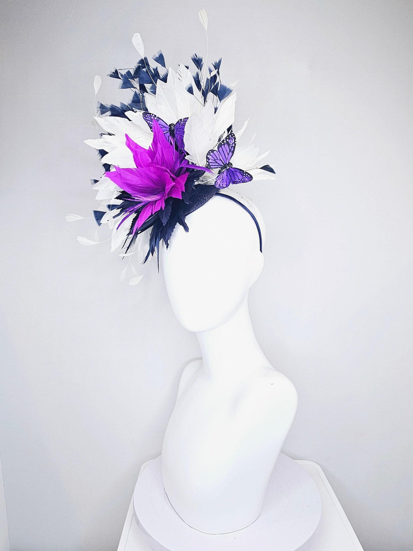 kentucky derby hat fascinator navy sinamay and navy blue purple feather flower navy and white feathers with purple and black butterflies