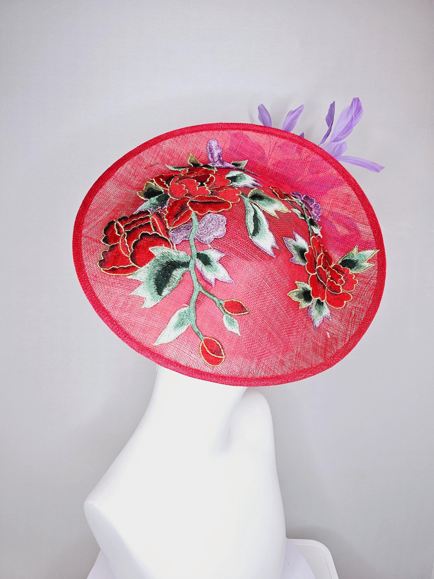 kentucky derby hat fascinator red sinamay saucer with red purple gold green embroidered flowers and lavender purple branching feathers