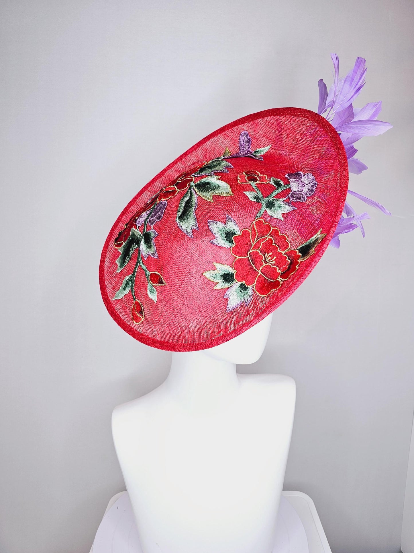 kentucky derby hat fascinator red sinamay saucer with red purple gold green embroidered flowers and lavender purple branching feathers