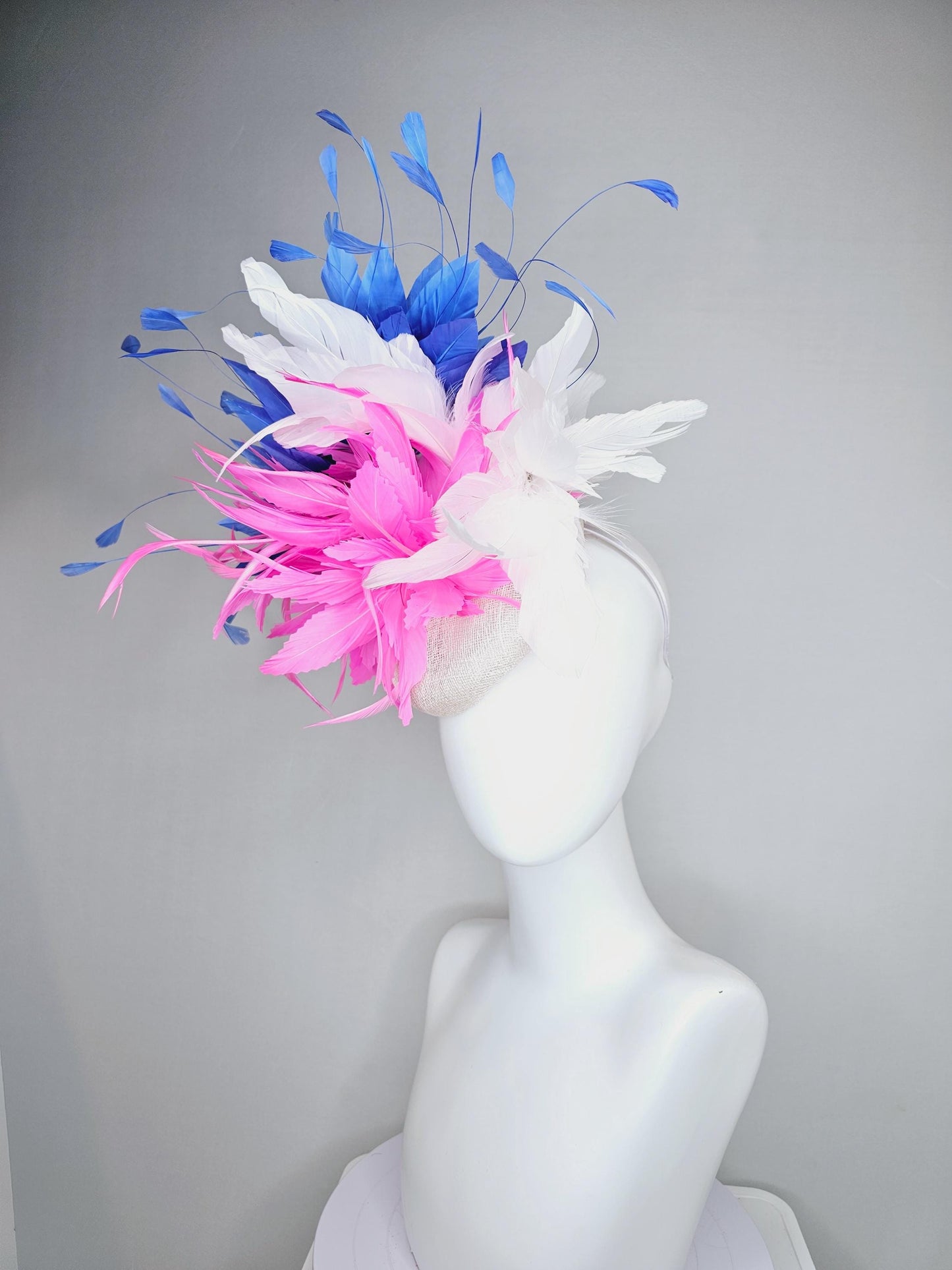 kentucky derby hat fascinator white sinamay with fluffy blush pink zigzag feather flower and white and cobalt royal blue branching feathers