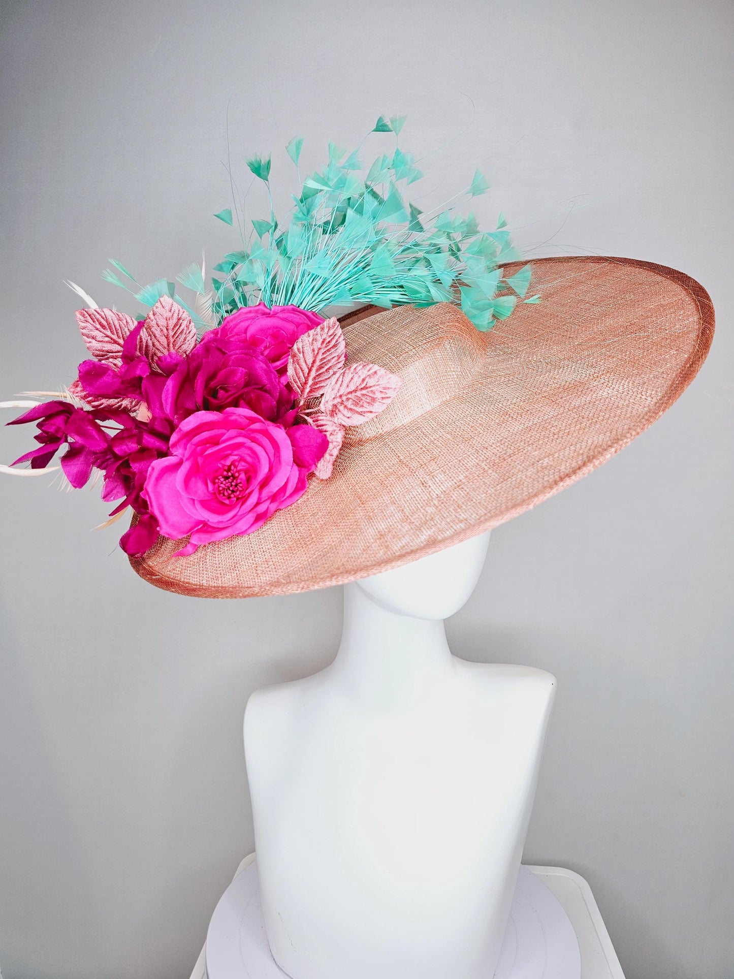 kentucky derby hat wide brim coral orange sinamay with bright fuchsia pink satin roses light pink leaves mint green neutral beige feathers