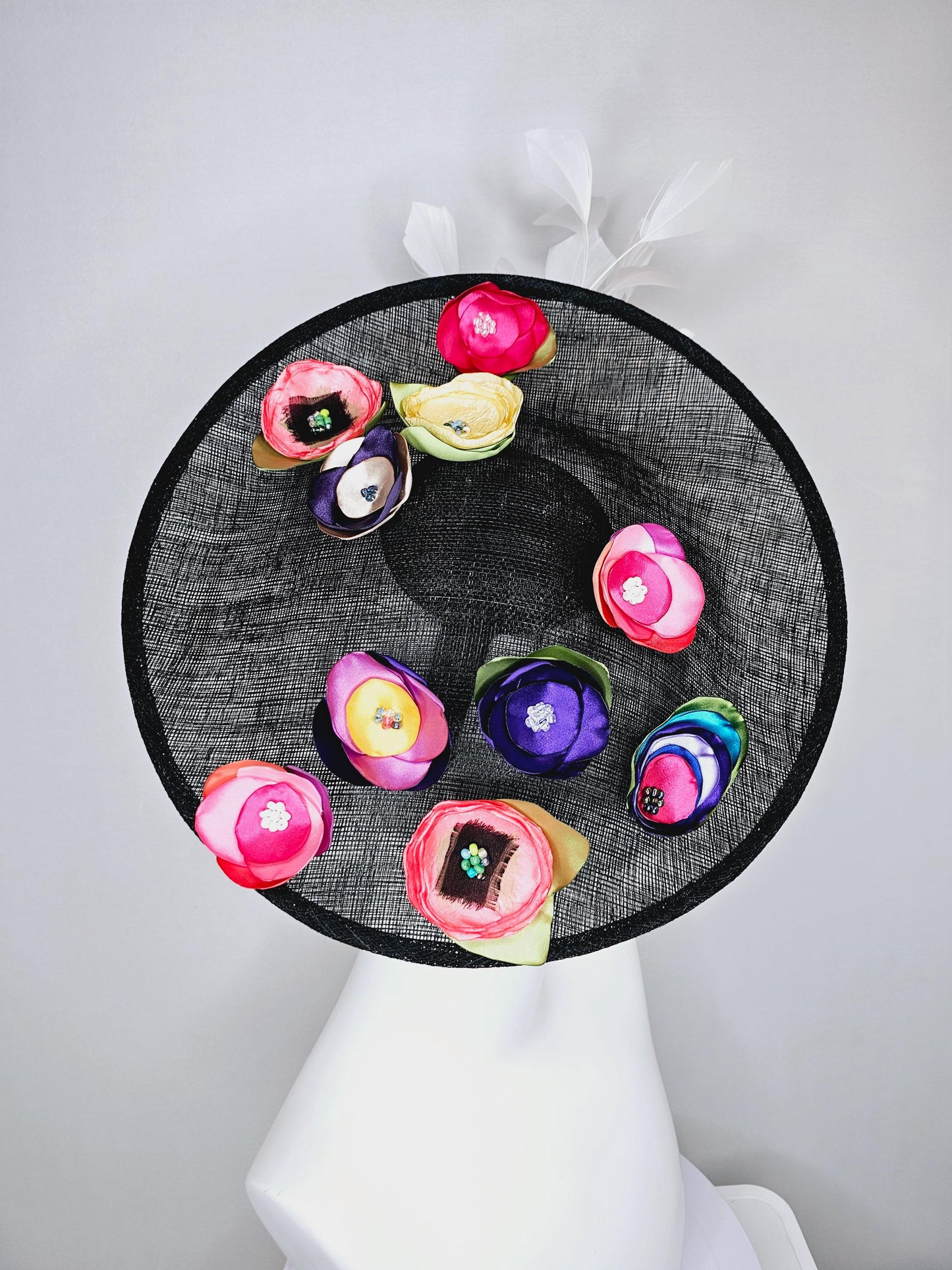 kentucky derby hat fascinator black sinamay saucer with colorful pink red coral orange yellow purple blue green satin flowers white feathers