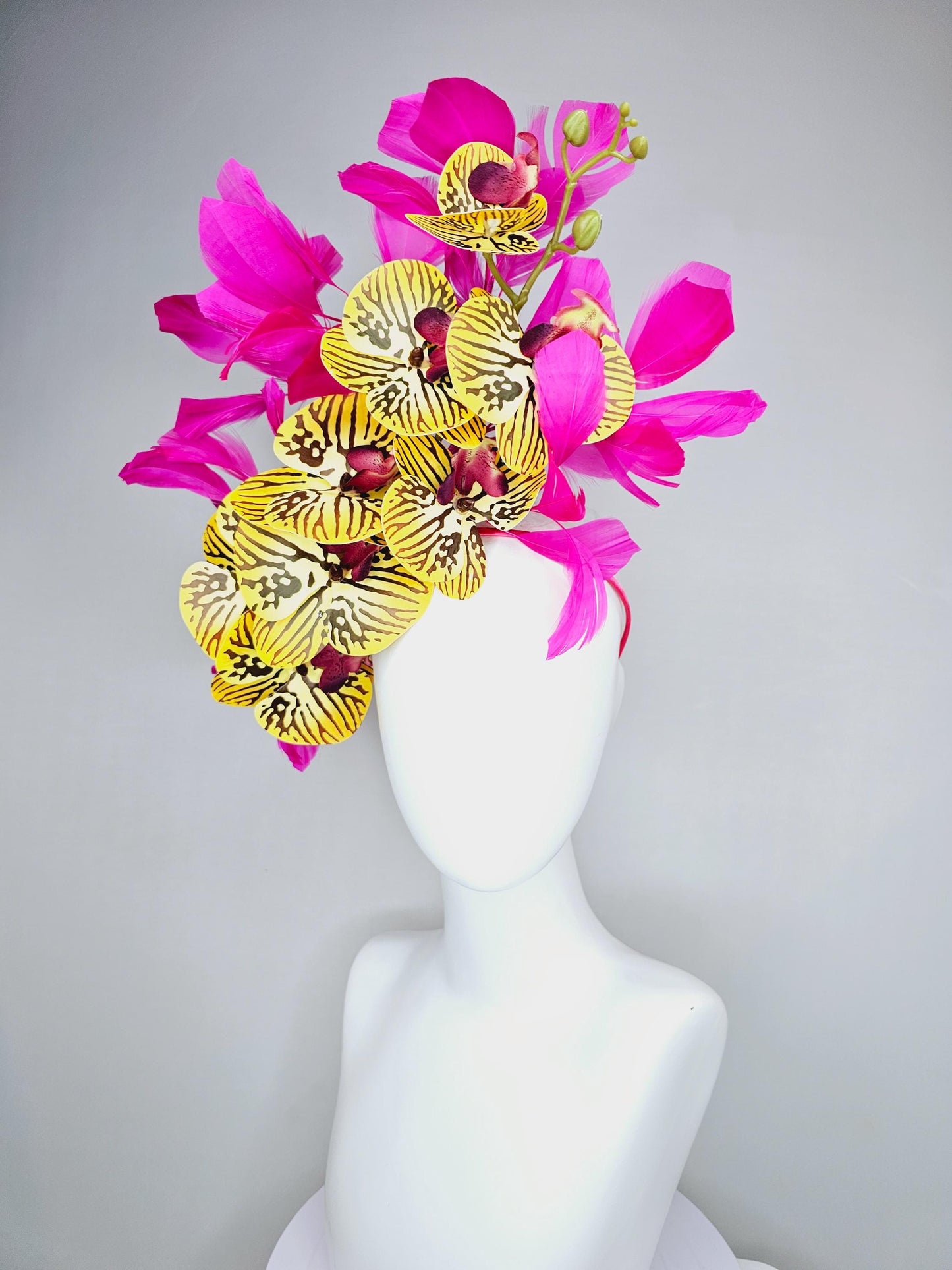 kentucky derby hat fascinator large yellow black and burgundy red satin silk orchid flowers with bright fuchsia pink branching feathers