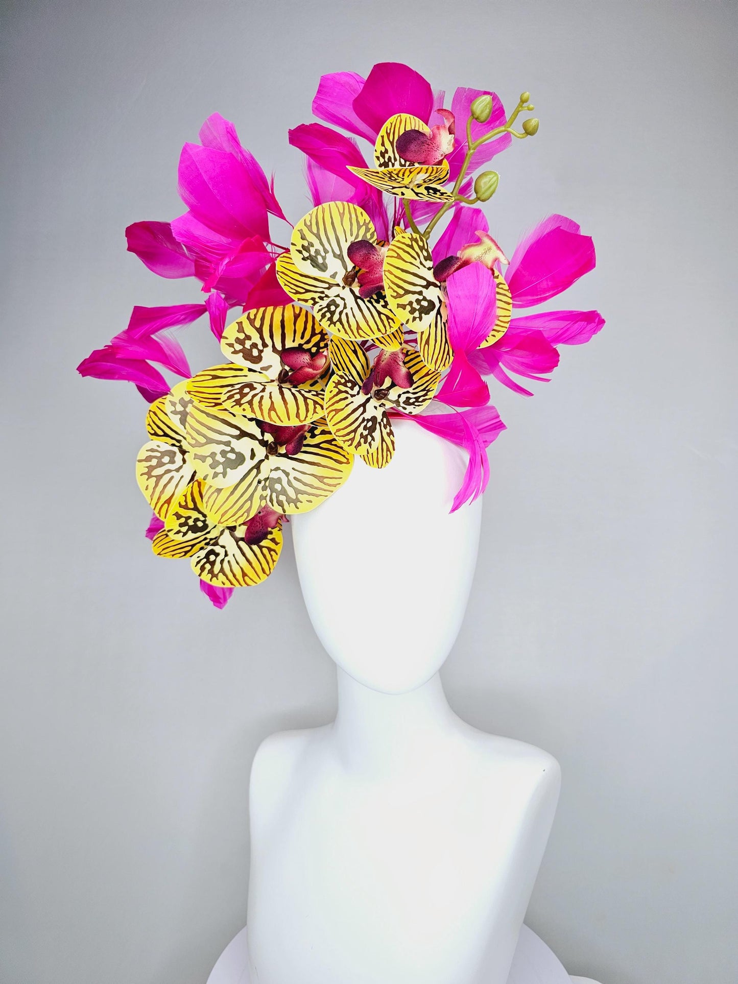 kentucky derby hat fascinator large yellow black and burgundy red satin silk orchid flowers with bright fuchsia pink branching feathers