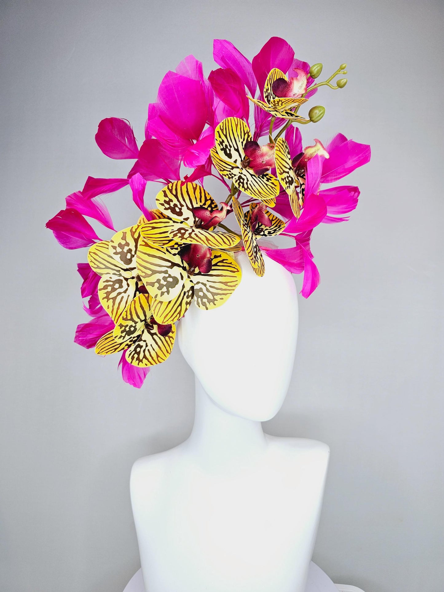kentucky derby hat fascinator large yellow black and burgundy red satin silk orchid flowers with bright fuchsia pink branching feathers