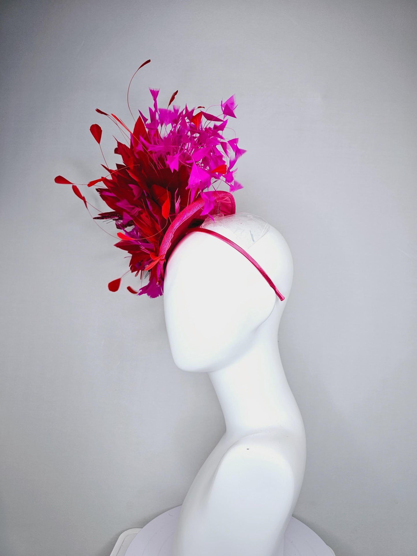 kentucky derby hat fascinator pink sinamay with scarlet red and fuchsia pink zigzag feather flower red pink feathers red pink butterflies