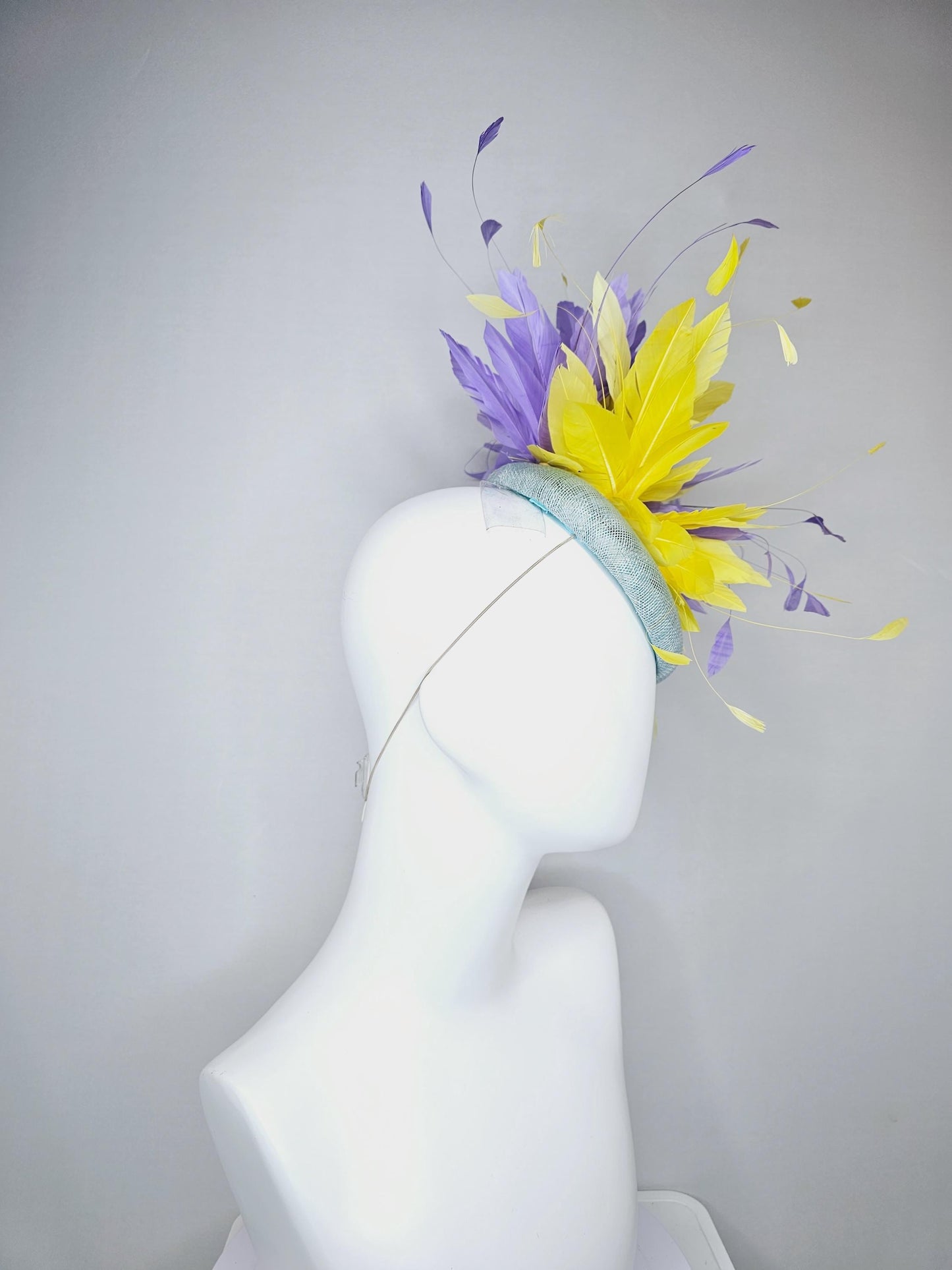 kentucky derby hat fascinator light blue sinamay base with bright yellow and lavender purple feathers