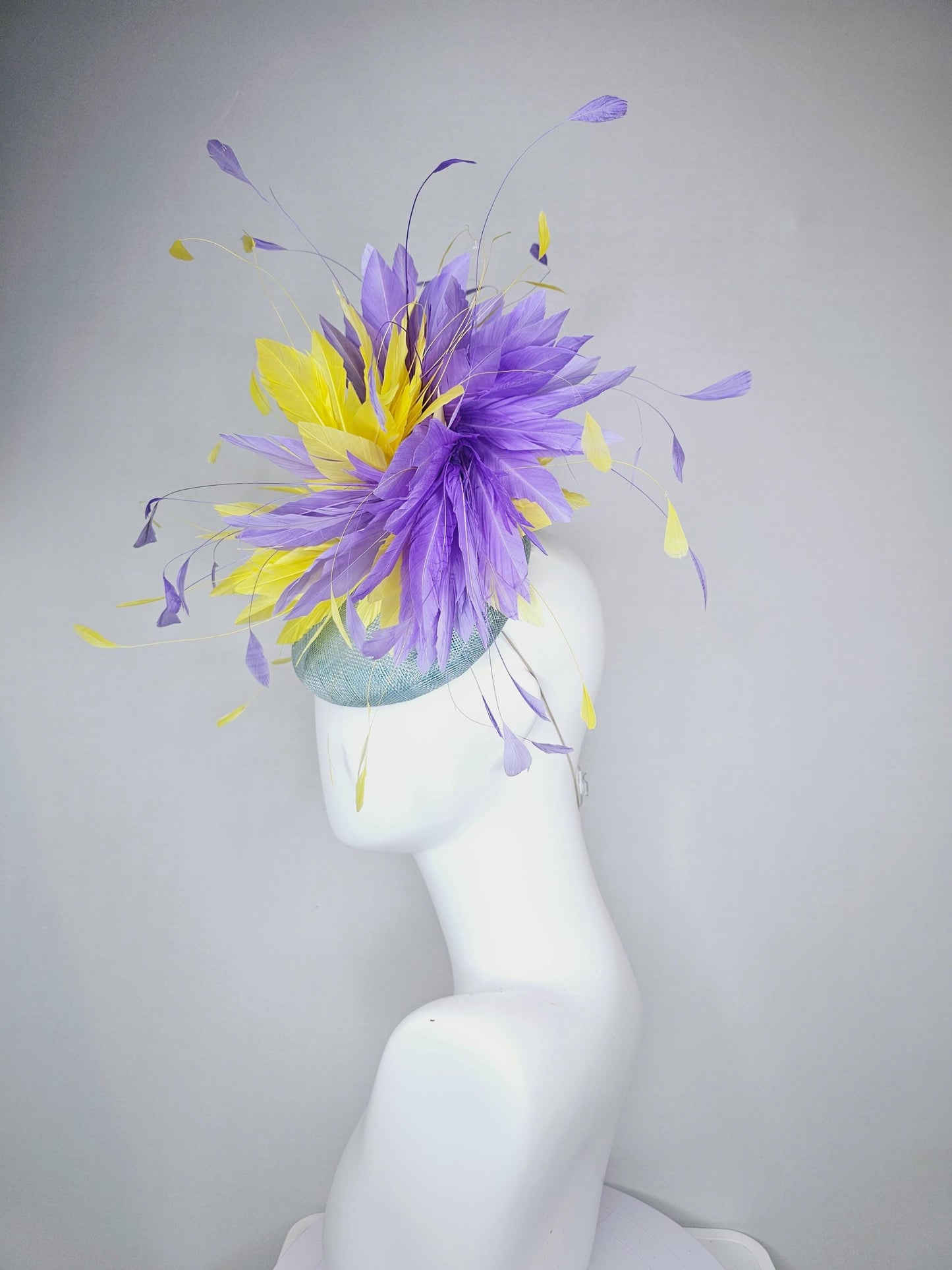 kentucky derby hat fascinator light blue sinamay base with bright yellow and lavender purple feathers