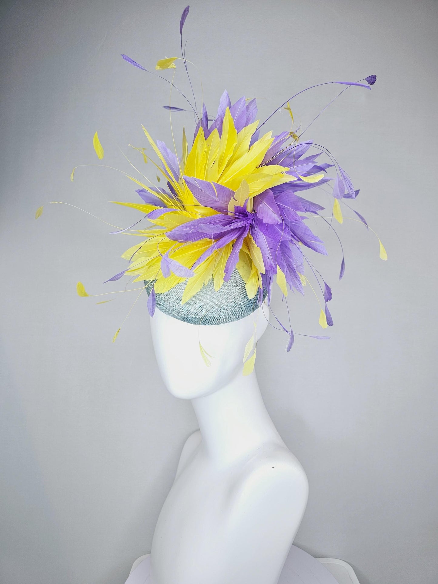 kentucky derby hat fascinator light blue sinamay base with bright yellow and lavender purple feathers