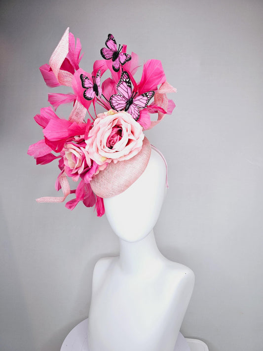 kentucky derby hat fascinator blush pink sinamay with sinamay curls, pink blush pink satin roses, pink feathers, pink and black butterflies